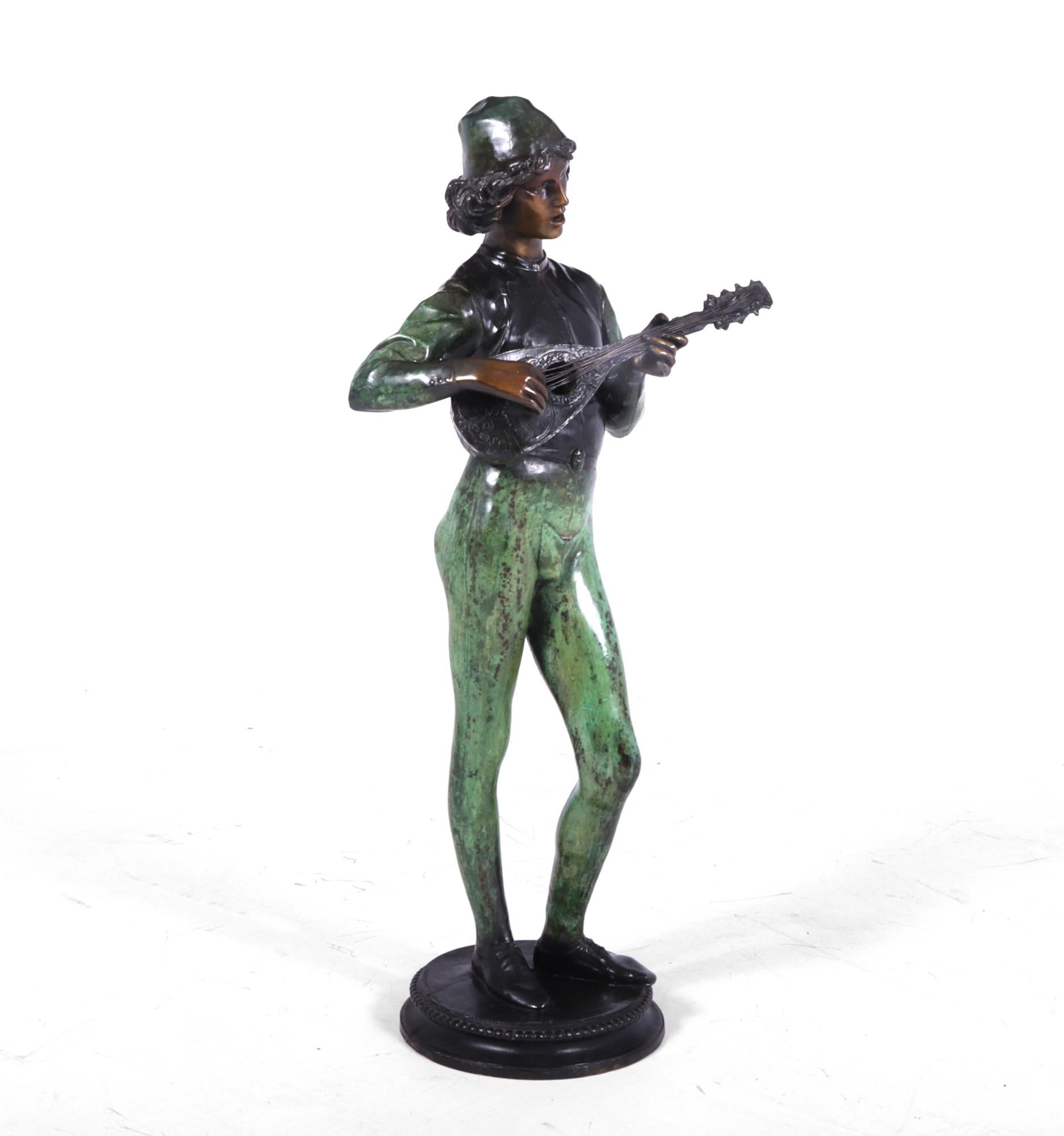 Antique bronze sculpture ‘Standing Music Man’ by Barbedienne Fondeur c1880
Sculpted by P Dubois in 1865, the music man was cast by Barbedienne Fondeur this example is 72 cm tall and cold painted with green legs and arm sleeves and great patina, the