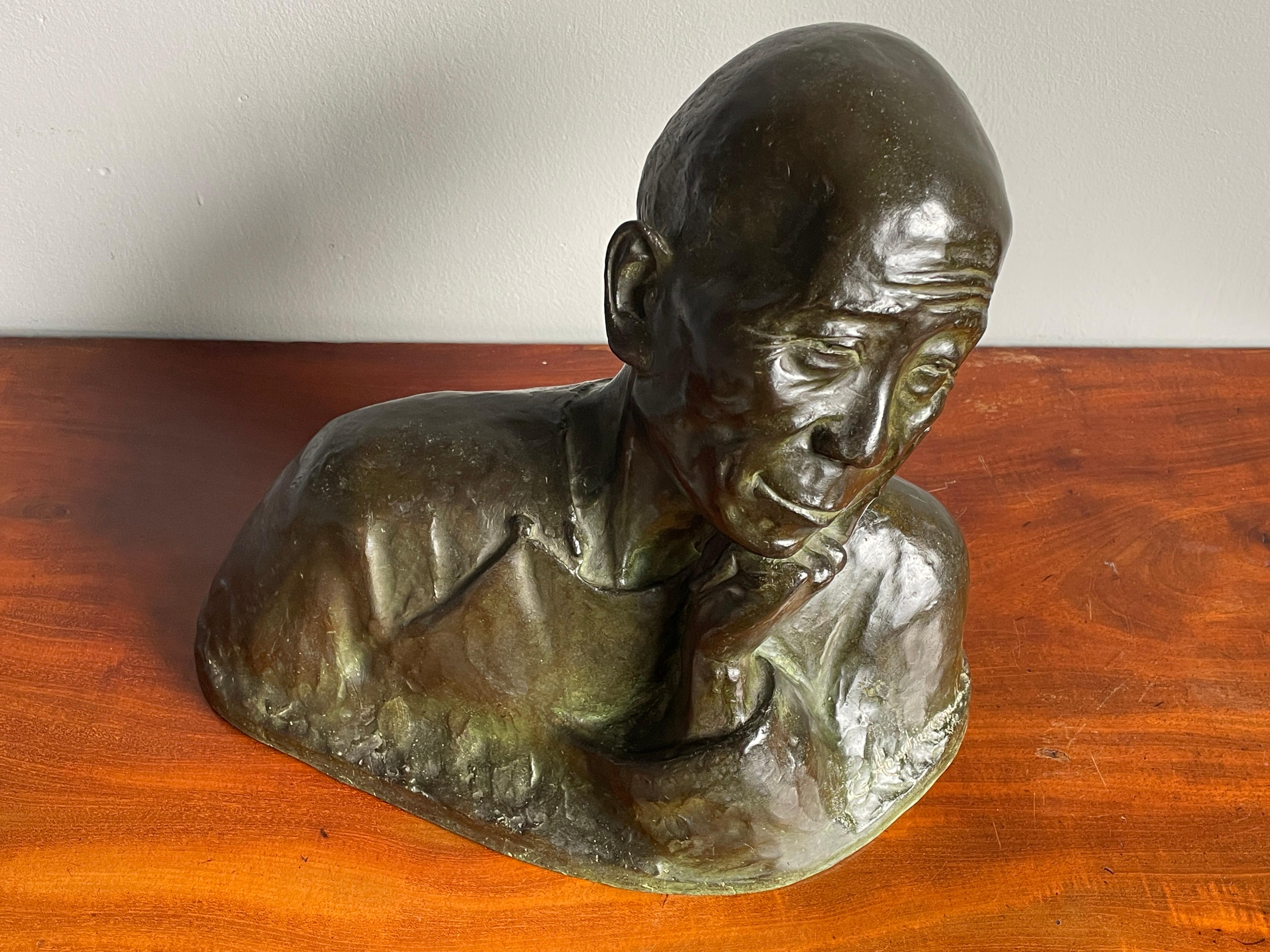 Stunning and rare bronze bust with important leather 'tag' for provenance.

This antique and mint bronze sculpture is of a timeless beauty and we are confident it will soon be enjoyed by a new custodian (possibly a museum). Gaston Hauchecorne was a