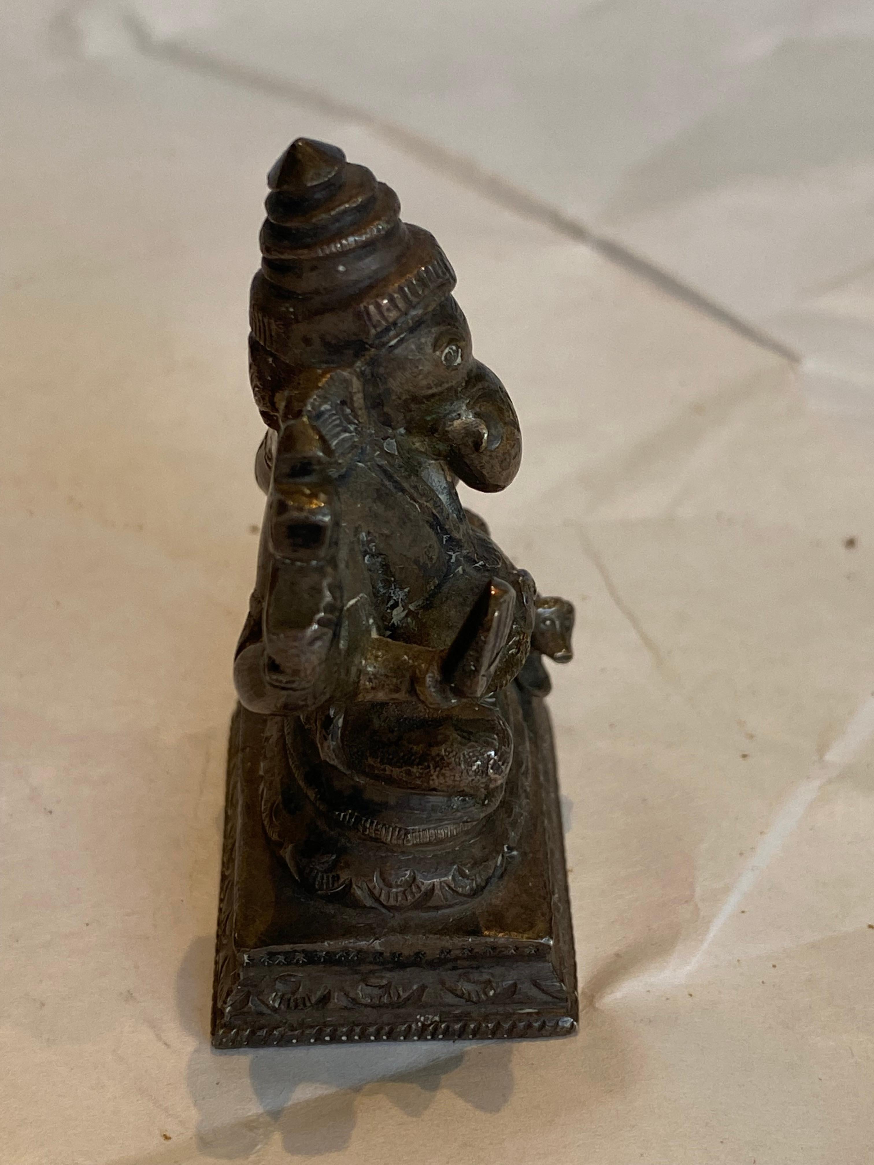 Antique Bronze Seated Ganesha with a Dog 1
