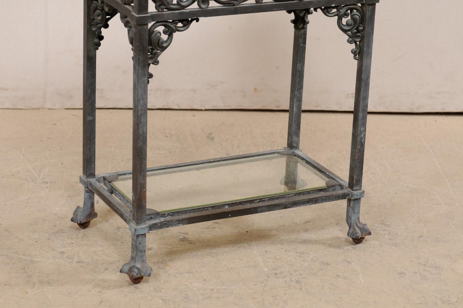 American Antique Bronze Table w/ Original Granite Top, Lower Glass Shelf, Acanthus Motif For Sale
