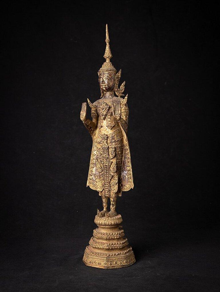 Material: bronze
48 cm high 
11 cm wide and 10,2 cm deep
Weight: 2.395 kgs
Gilded with 24 krt. gold
Abhaya mudra
Originating from Thailand
19th century - Rattanakosin period.
 