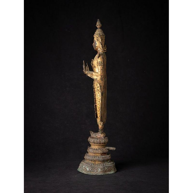 standing buddha statue thailand