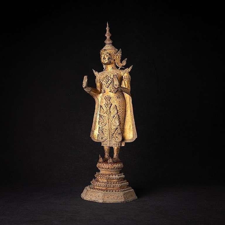 Material: bronze
72,3 cm high 
16,8 cm wide and 16,5 cm deep
Weight: 6.760 kgs
Gilded with 24 krt. gold
Abhaya mudra
Originating from Thailand
19th century - Rattanakosin period.
 