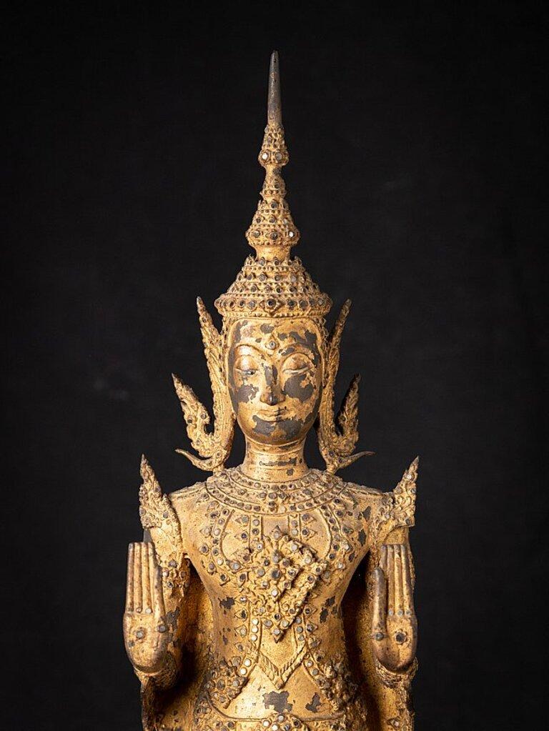 Material: bronze
69,7 cm high 
17 cm wide and 16,8 cm deep
Weight: 7.788 kgs
Gilded with 24 krt. gold
Abhaya mudra
Originating from Thailand
19th century
Rattanakosin period.
 