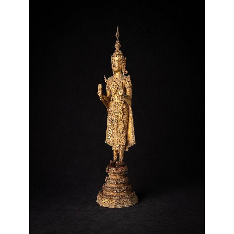 Material: bronze
55,9 cm high 
12,8 cm wide and 12,7 cm deep
Weight: 3.825 kgs
Gilded with 24 krt. gold
Abhaya mudra
Originating from Thailand
19th century - Rattanakosin period

 