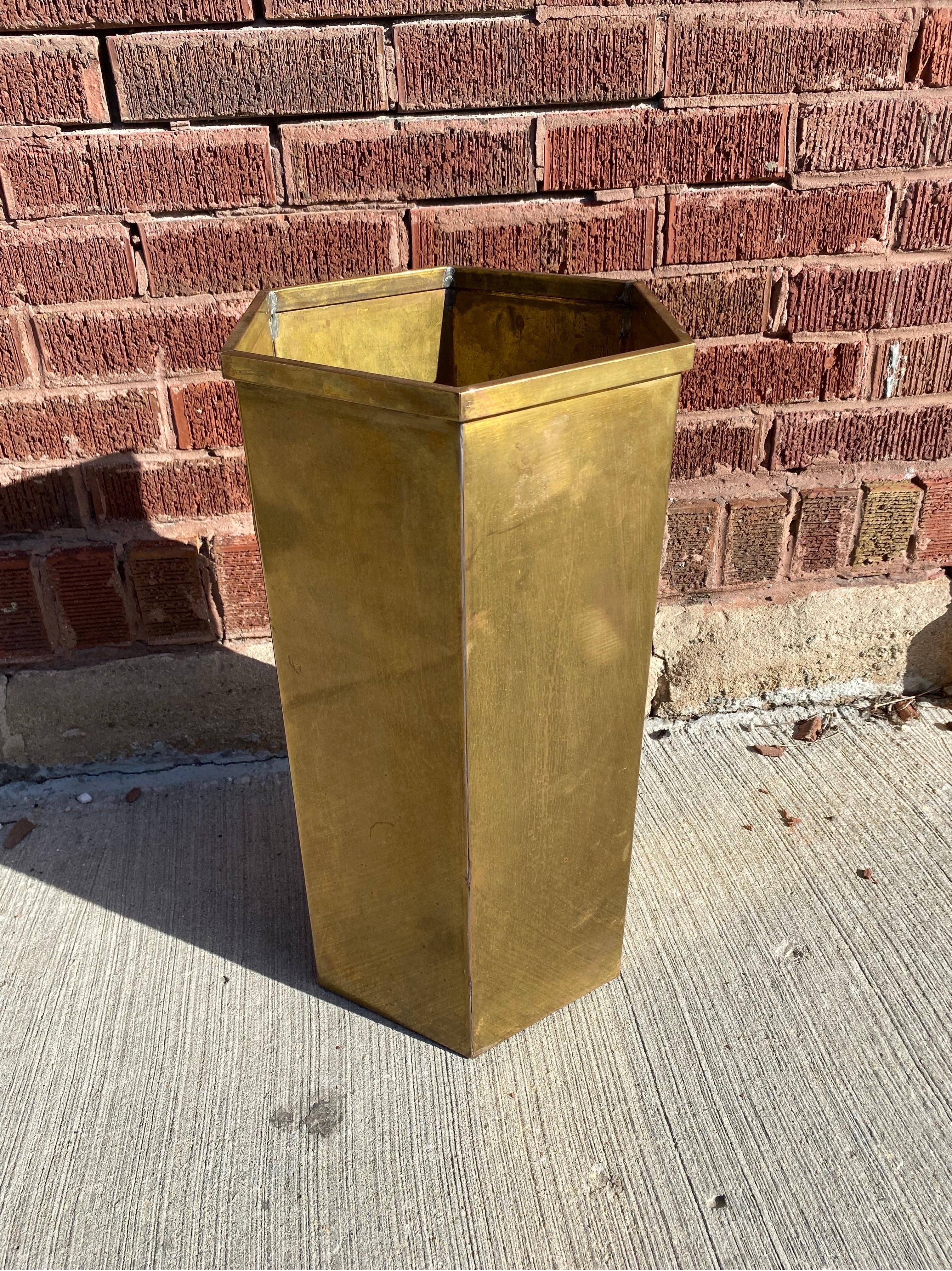 Antique Bronze Umbrella Stand
This antique bronze bin can have multiple uses in your home or office. From umbrella stand to wastepaper bin this antique will elevate your space with bronze warmth. 

Circa Early 20th Century

Dimensions:

W 9”
D