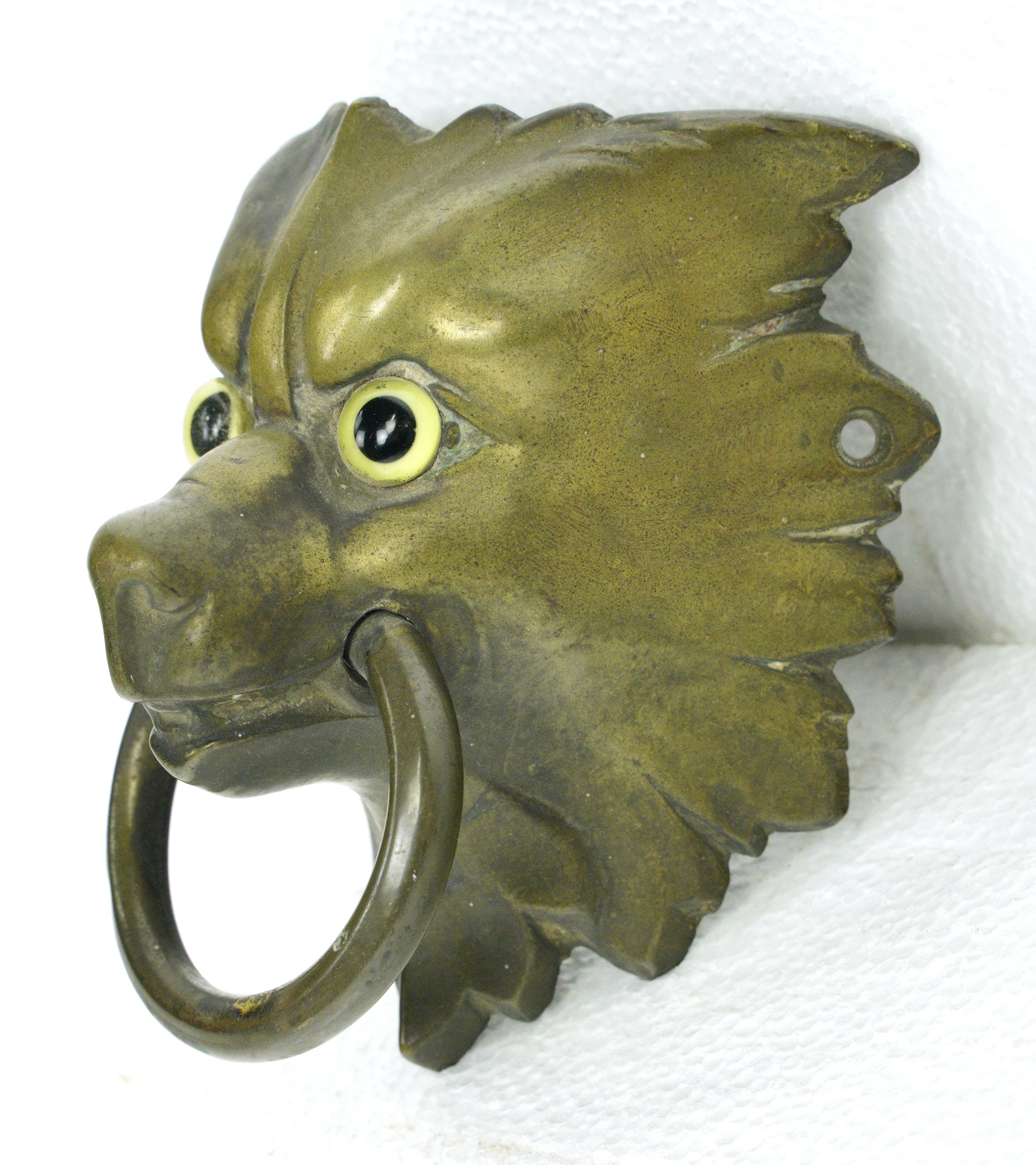 Antique Bronze Wolf Head Glass Eyes Ring Pull In Good Condition For Sale In New York, NY