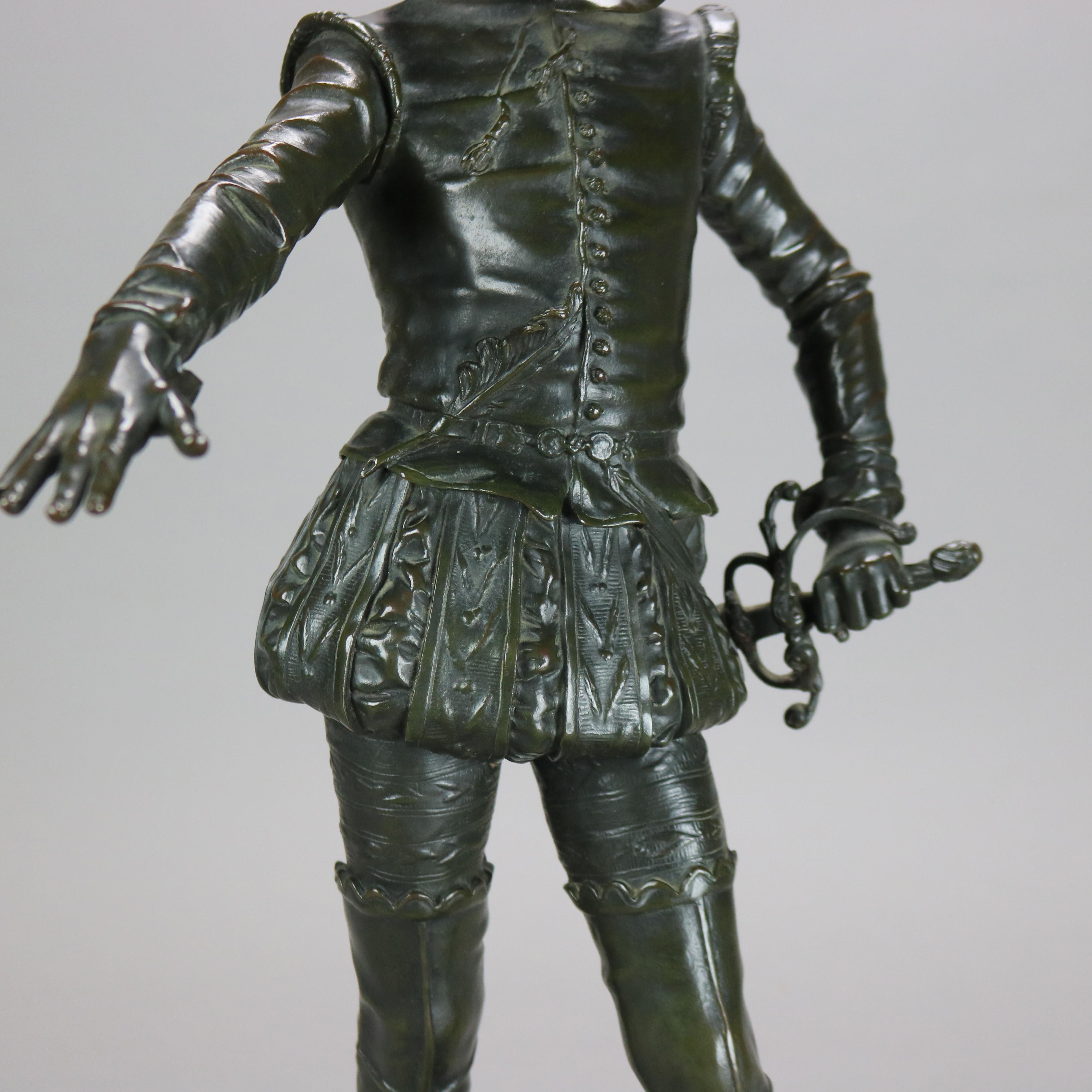 Sculpture ancienne en métal bronzé représentant un jeune courtisan brandissant une épée, signée Rambaud 6