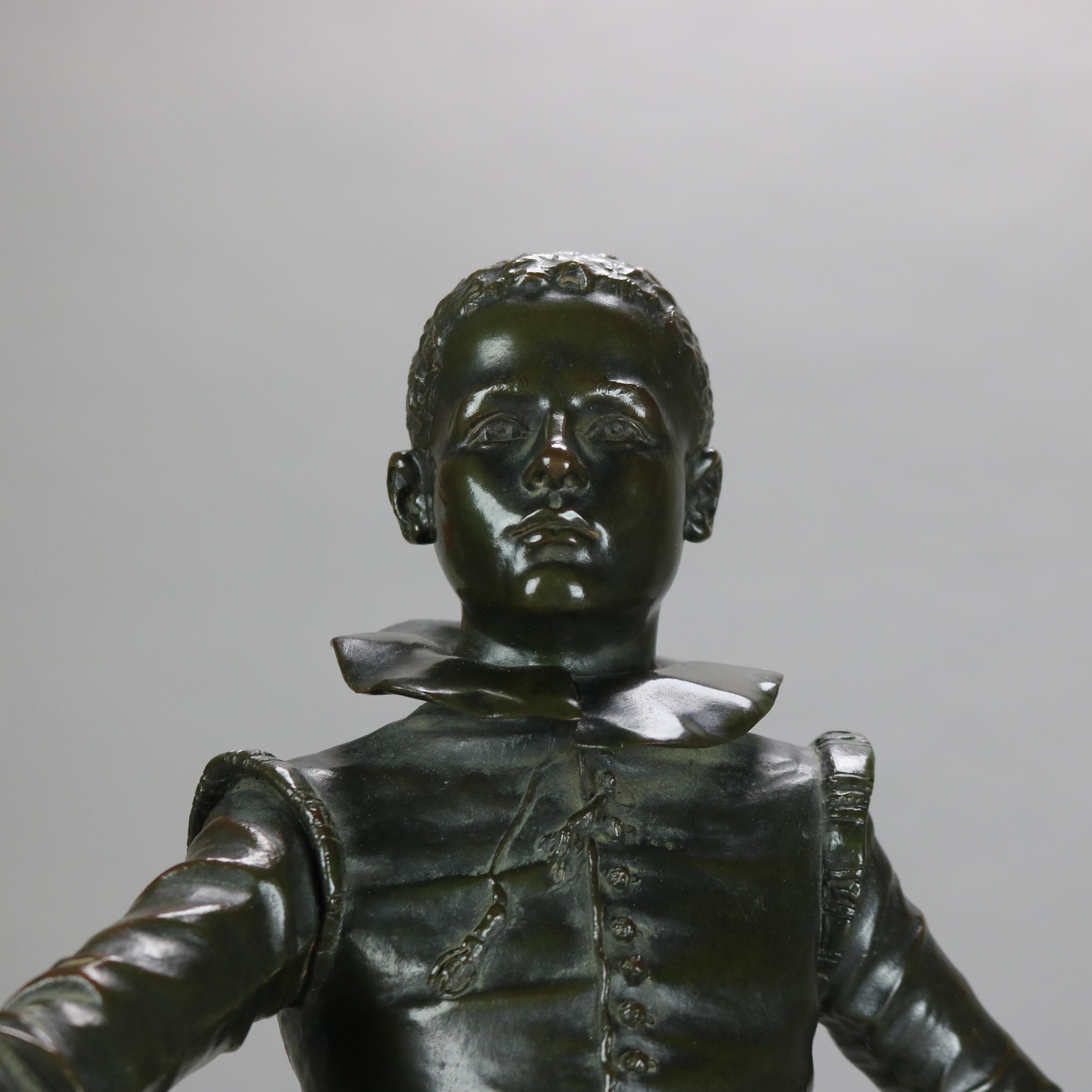 Sculpture ancienne en métal bronzé représentant un jeune courtisan brandissant une épée, signée Rambaud 2