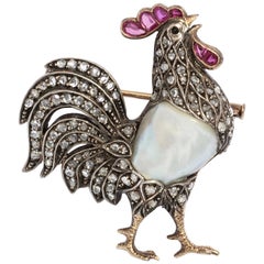 Broche ancienne en diamant:: perle et rubis