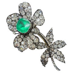 Antique Brooch with Emerald and Diamond in 18K Gold and Silver.
