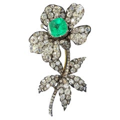 Antique Brooch with Emerald and Diamond in 18K Gold and Silver.