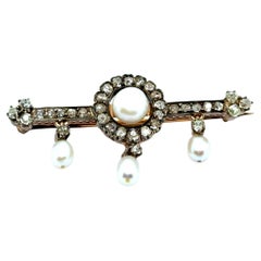 Antique Brooch with Natural Pearls & Diamonds in Silver & 14 Karat Yellow Gold
