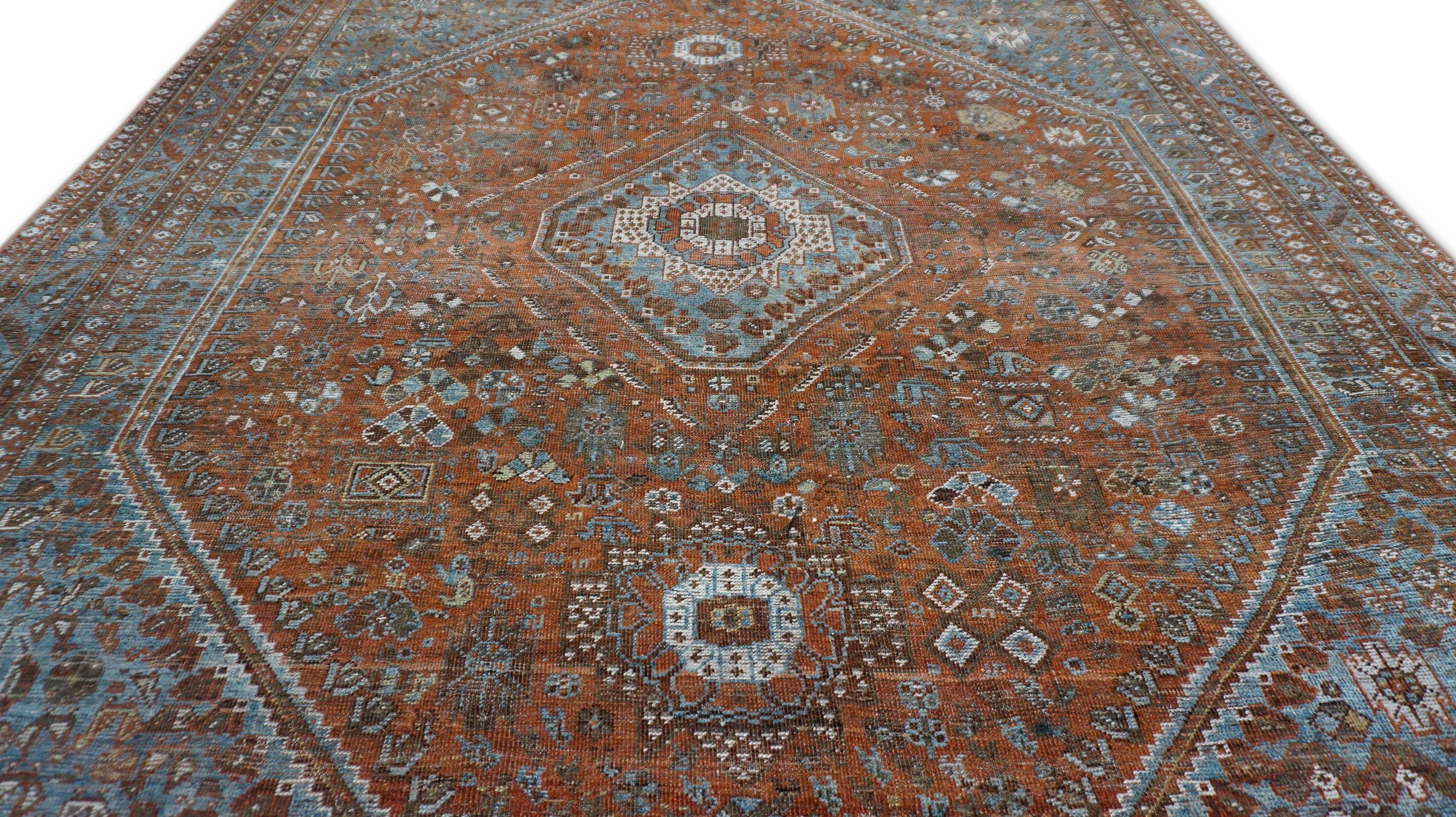 This antique Heriz rug is a striking example of the bold, geometric designs for which the Heriz region is renowned. Hand-knotted from high-quality, hand-spun wool, this piece embodies the durability and distinctive style that has made Heriz rugs