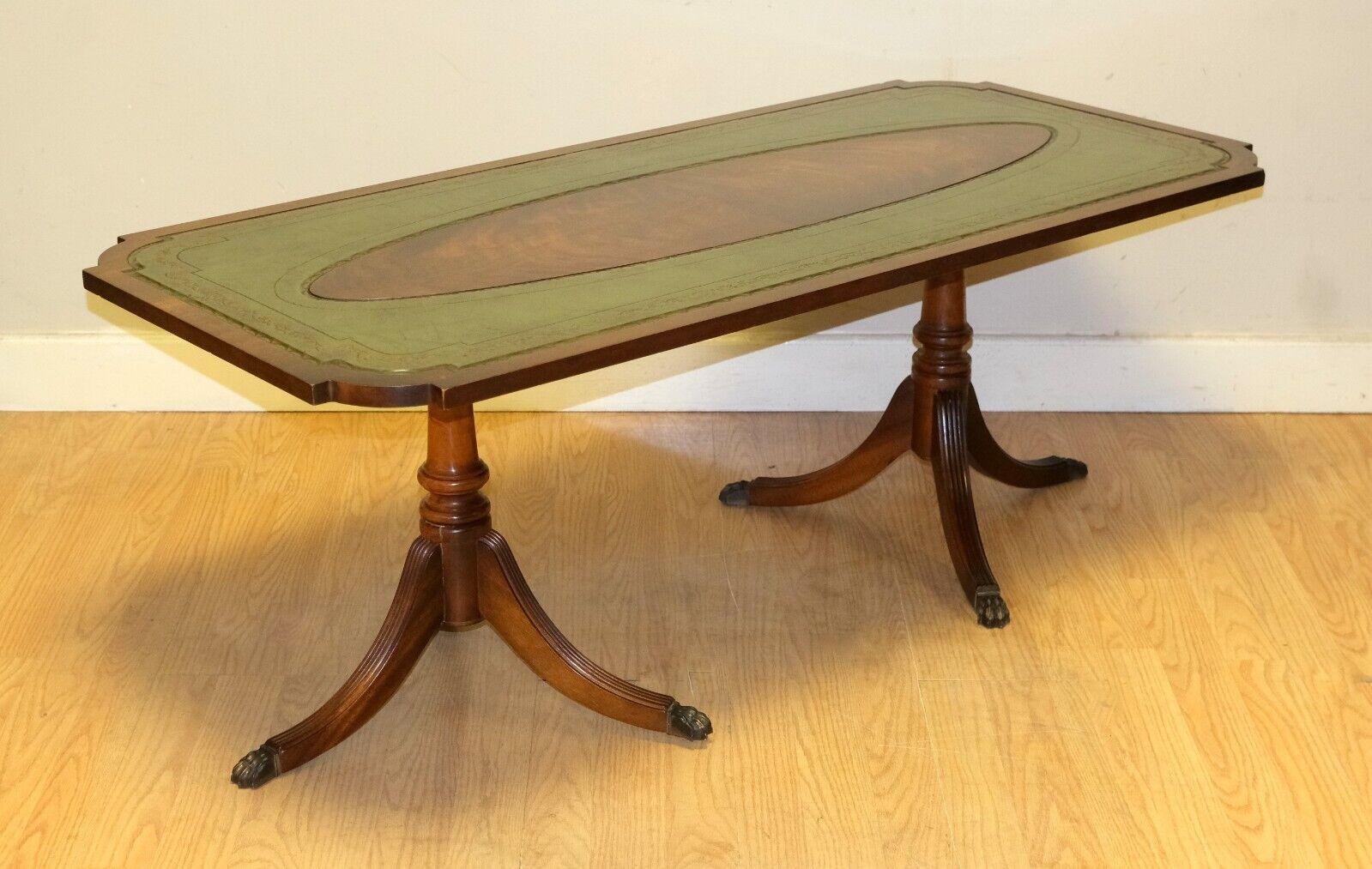 We are delighted to offer for sale this elegant Bevan Funnell green leather top brown mahogany coffee table. 

A very well made and elegant coffee table from the well known, British furniture makers, Bevan Funnell. The leather top and the gold