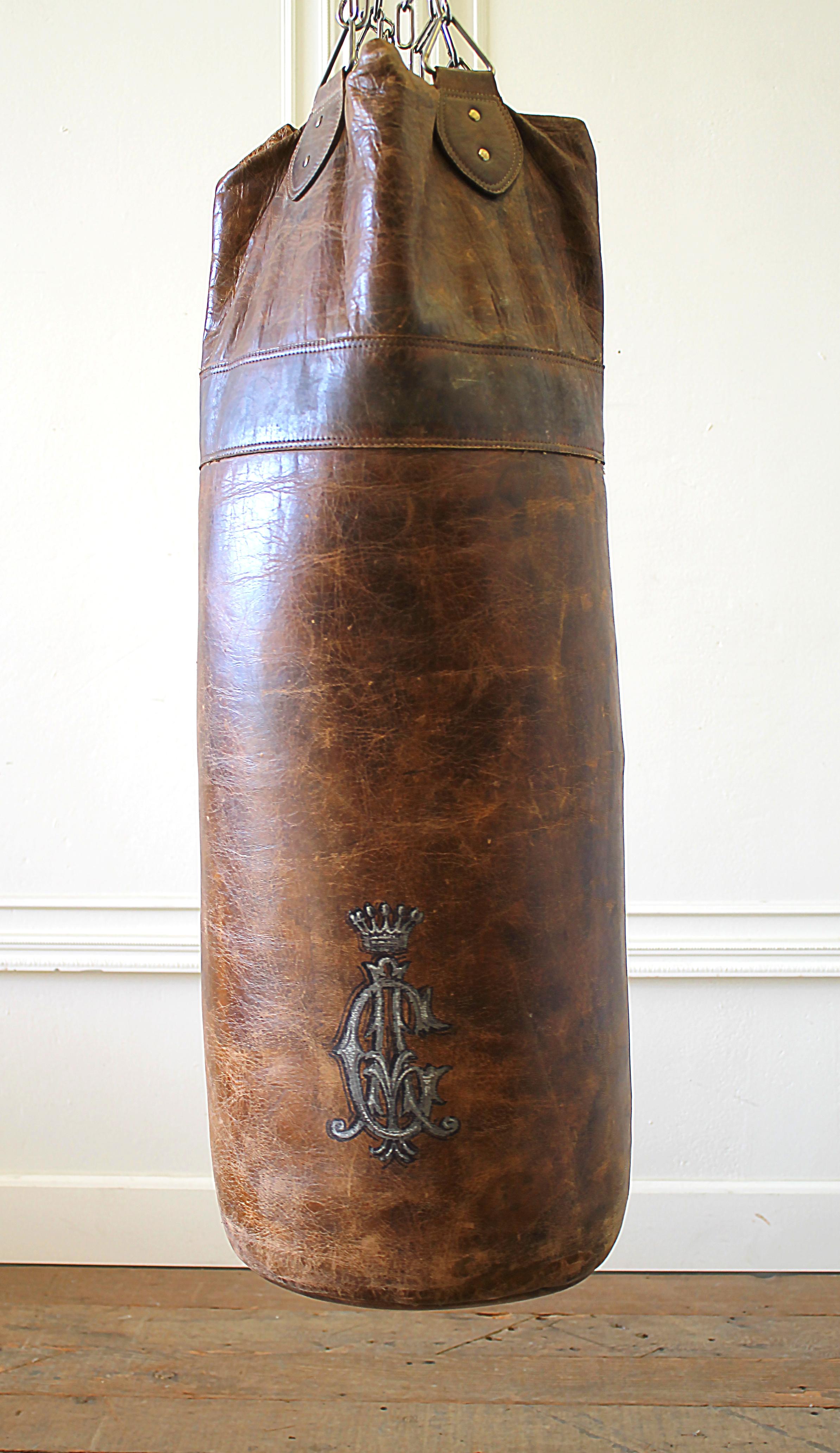 Antique brown leather punching bag, Ireland
With painted monogram 