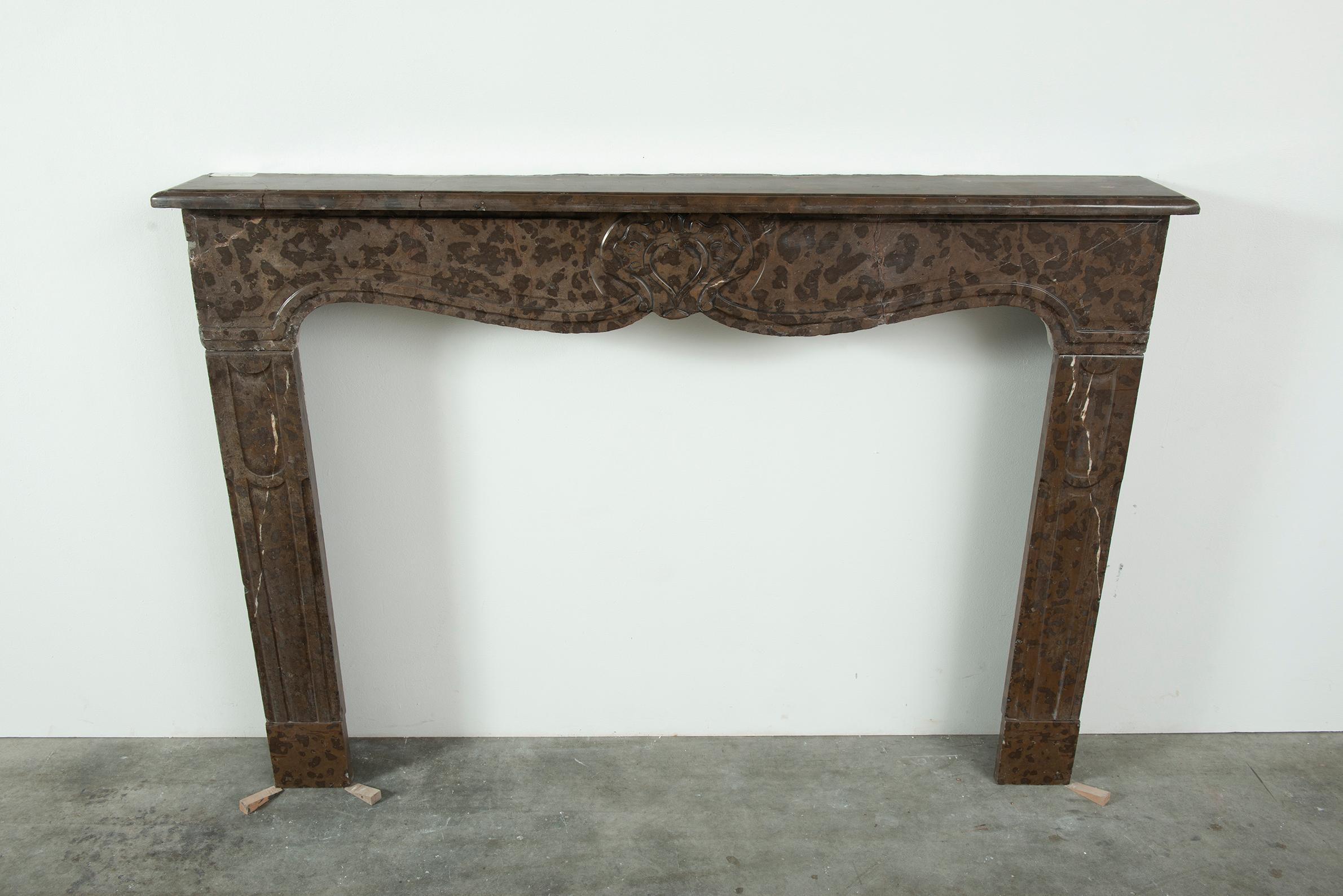 Carved Antique Brown Marble Fireplace For Sale