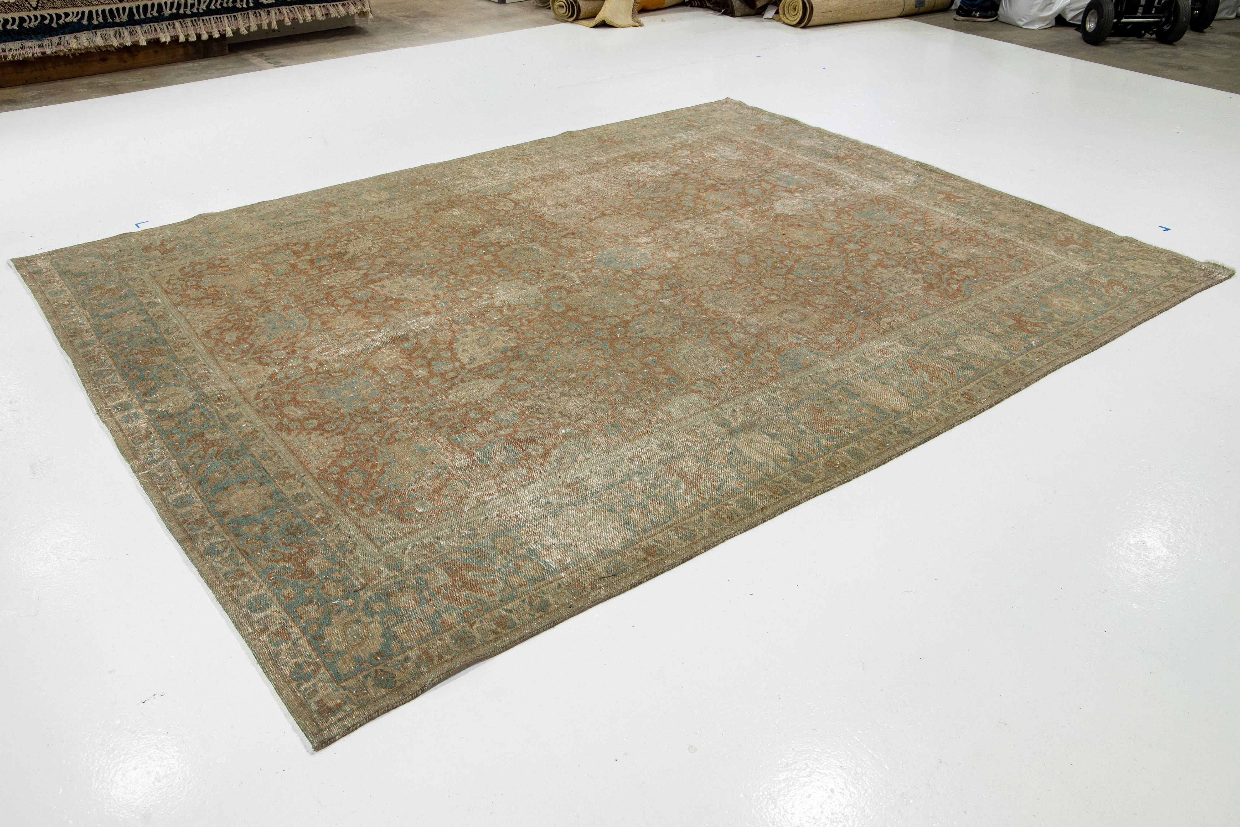 20th Century Antique Brown Wool Rug Persian Tabriz Floral Designed From The 1920s  For Sale