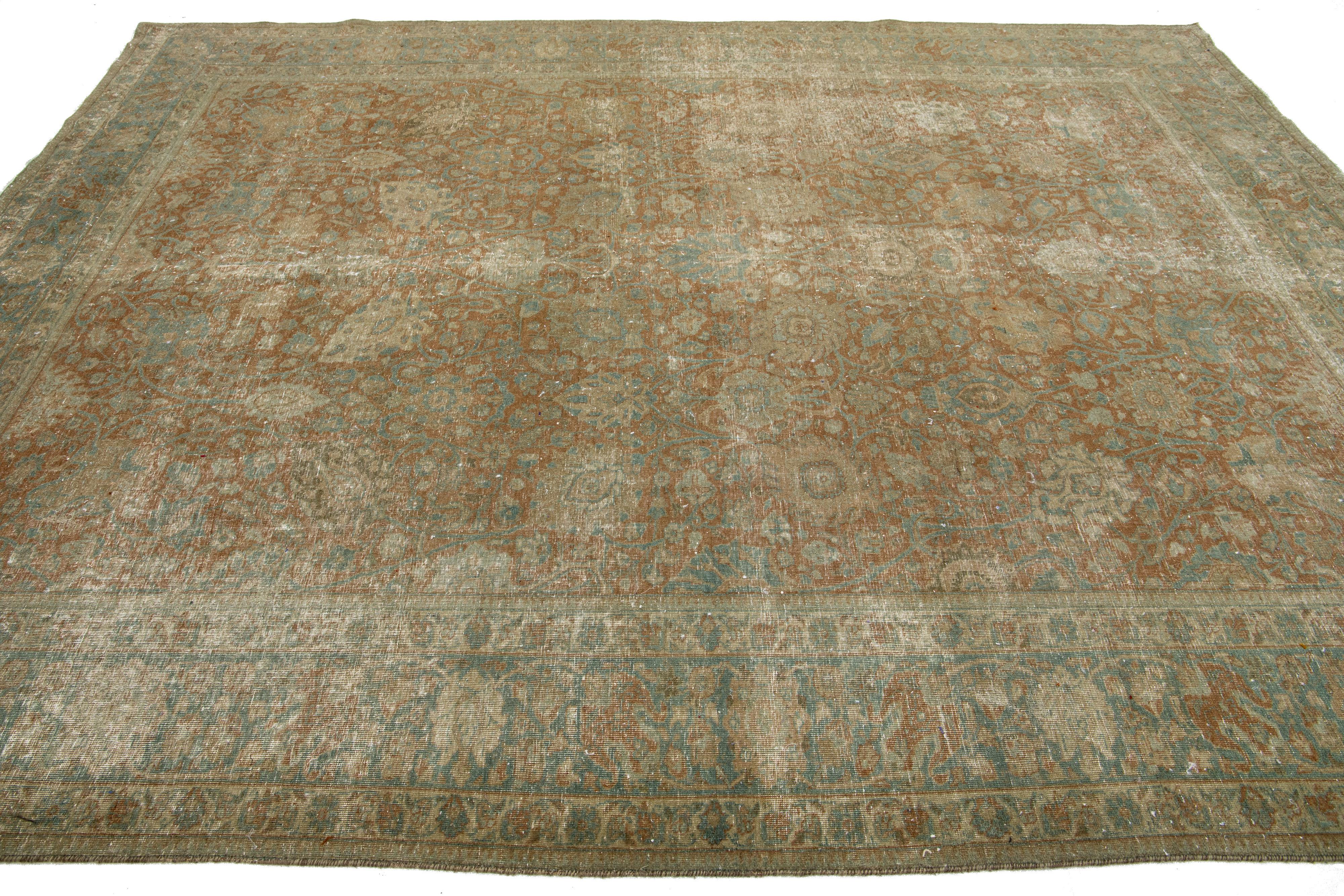 Antike Brown Wool Rug Persian Tabriz Floral Designed From The 1920s (20. Jahrhundert) im Angebot