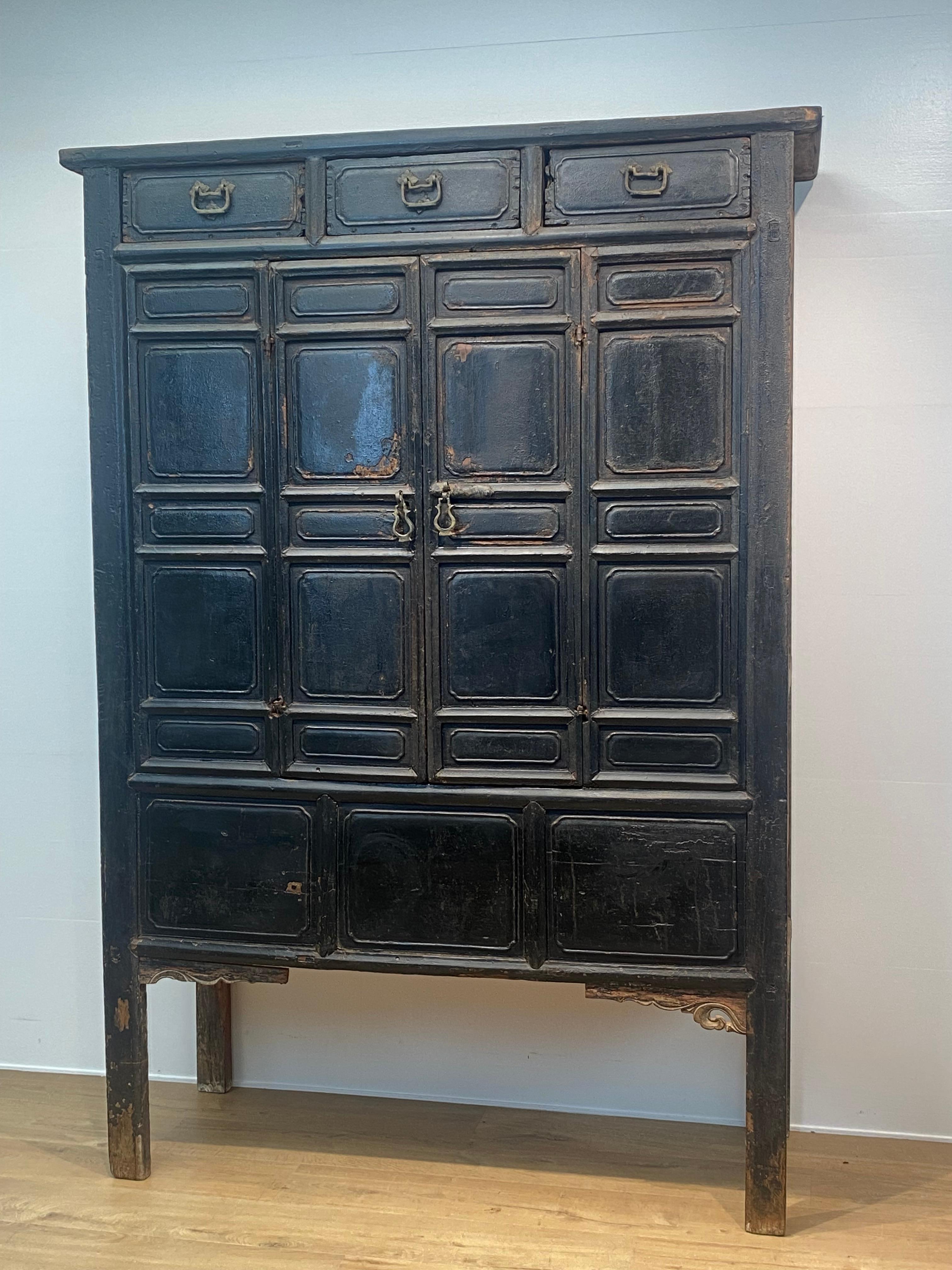 A beautiful Chinese, Brutalist Cabinet from the Shanxi Province ,
19 th Century, the cabinet has 2 big doors and 3 drawers,
the cabinet has an extraordinary patina and shine, beautiful wear used 
to age,there are also 2 sliding doors in the inside