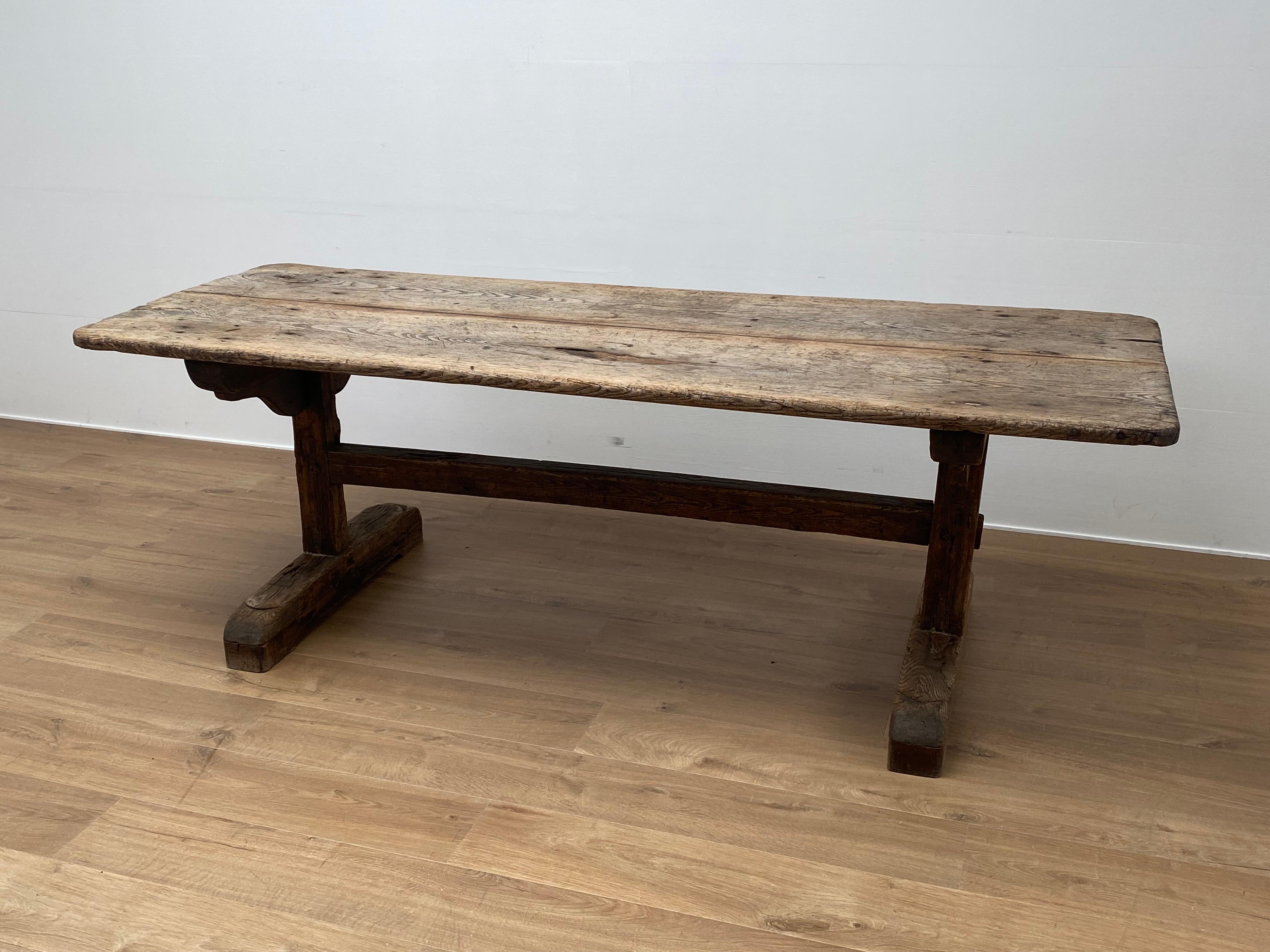 Beautiful French antique Brutalist Farm Table in a Blond Oak Wood,
good shine and patina of the wood,
table on two block feet connected with a stretcher,
can be used for different purposes; as desk as a kitchen table or as a console.