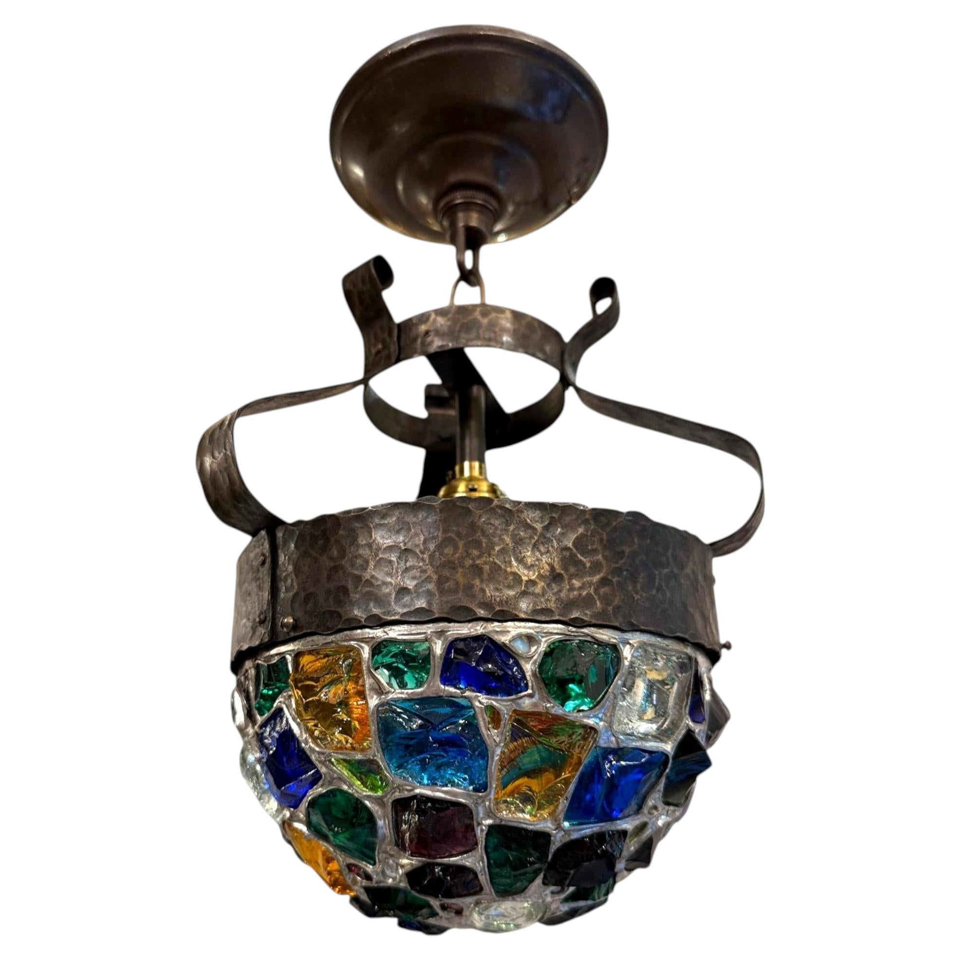 Antique Brutalist Hammered Metal and Color Leaded Glass Pendant Light Fixture For Sale