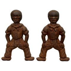 Vintage Brutalist Pair of Iron African Art Male Figurine Fireplace Log Andirons