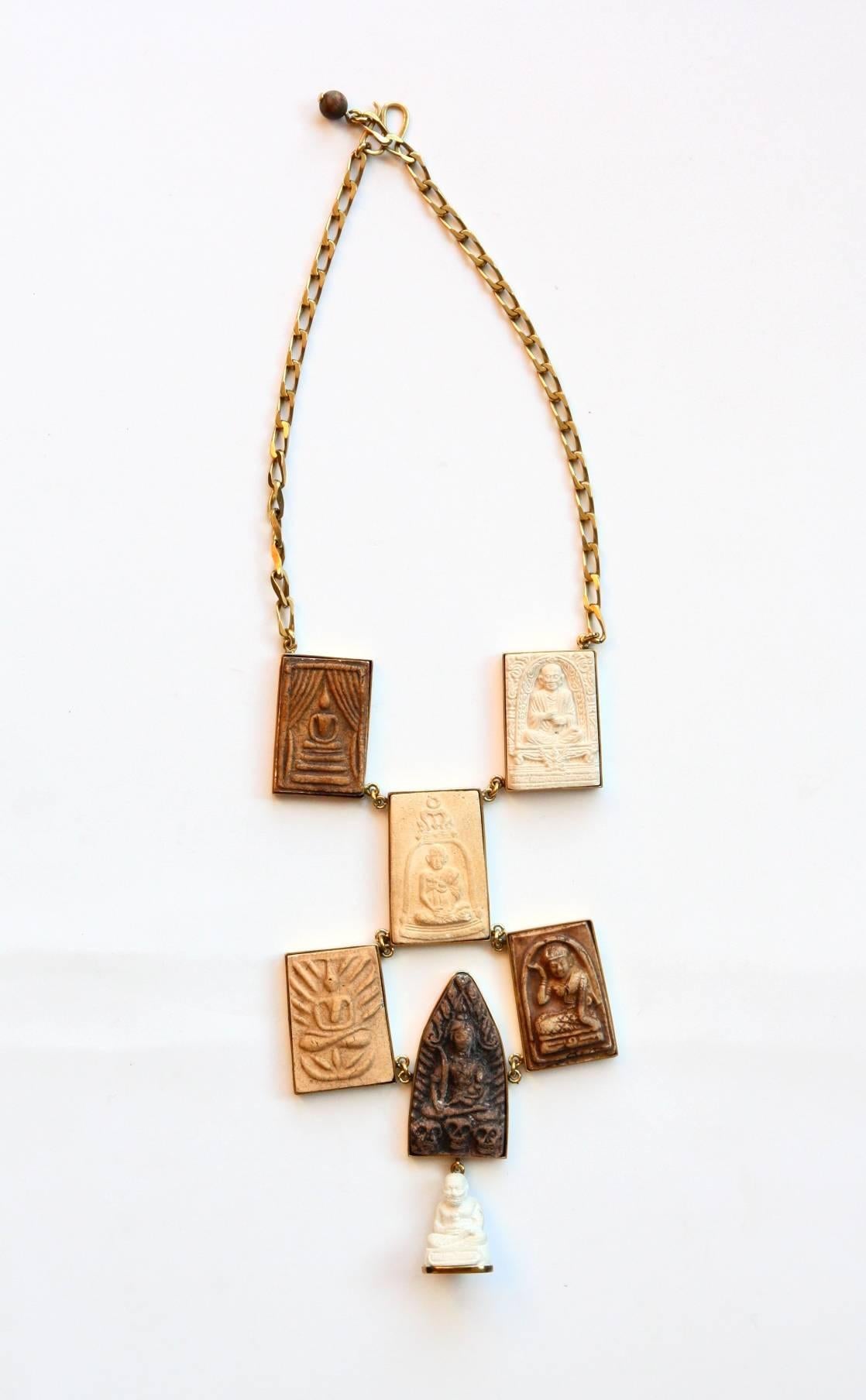 Antiques buddha terracotta amulets with buddha different shape, bronze linked adjustable. 
All Giulia Colussi jewelry is new and has never been previously owned or worn. Each item will arrive at your door beautifully gift wrapped in our boxes, put