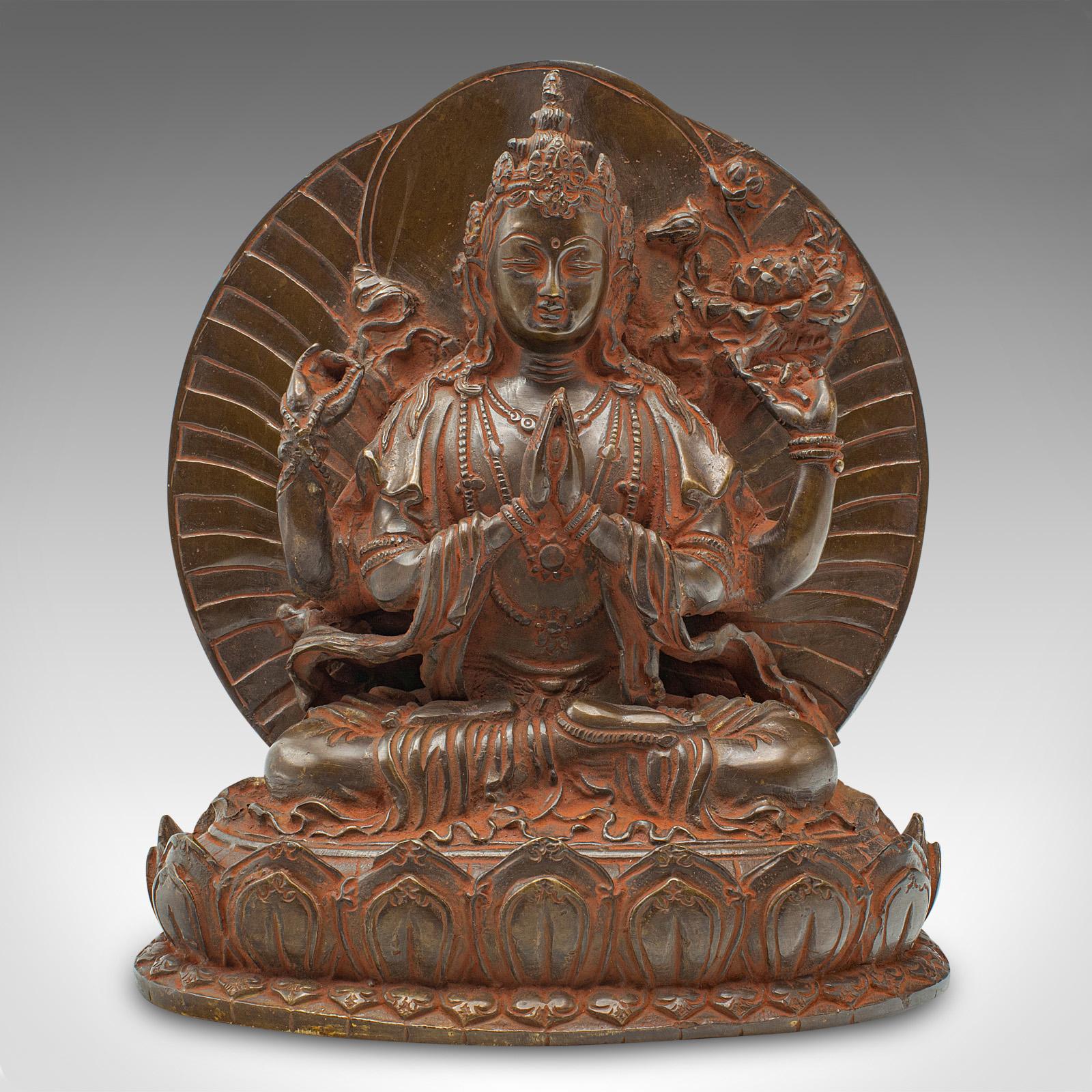 
This is an antique Buddhist Avalokiteshvara figure. An Asian, bronze religious deity, dating to the late Victorian period, circa 1900.

Delightful rendition of the Bodhisattva Avalokiteshvara, also known as Guanyin in Chinese
Displays a desirable