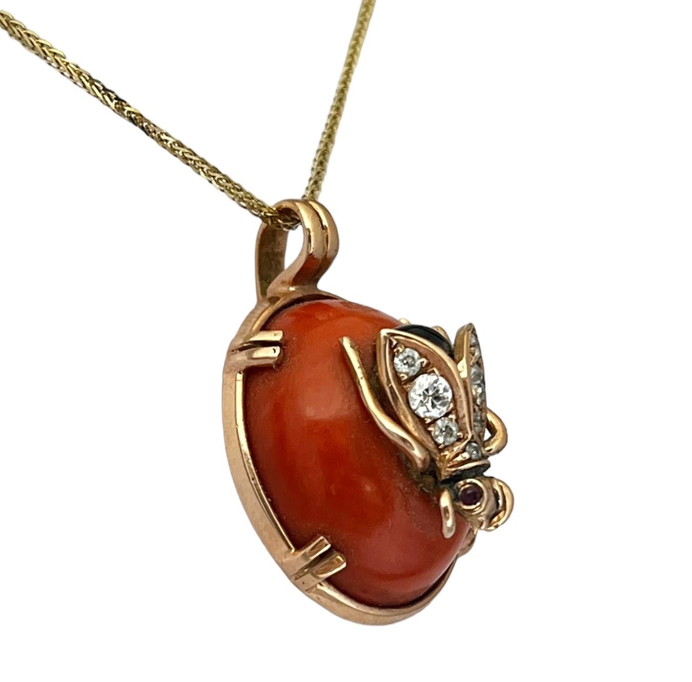 This antique bug-like Russian gold pendant, is set with old cut diamonds and cabochon coral,
Beautiful goldsmith's work of the pendant corresponding to the style of jewelry from the end of the 19th century and the beginning of the 20th century which