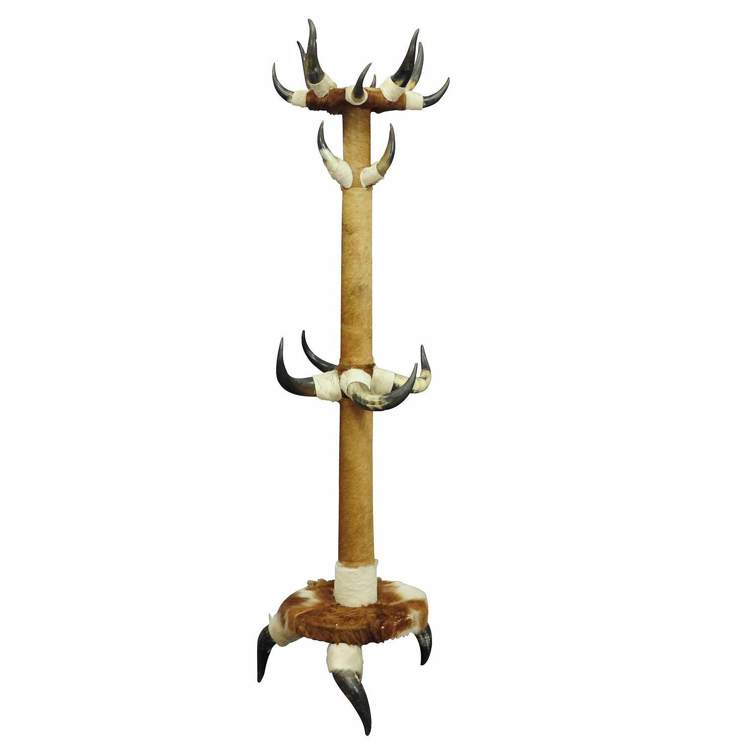Antique Bull Horn Hall Stand with Cow Fur ca. 1870
Item e5682
A bull horn hall stand ca. 1870, covered with vintage cattle fur which has to be renewed (is loosing the hairs). It is manufactured in Austria ca. 1870.

Antler furniture have been one of