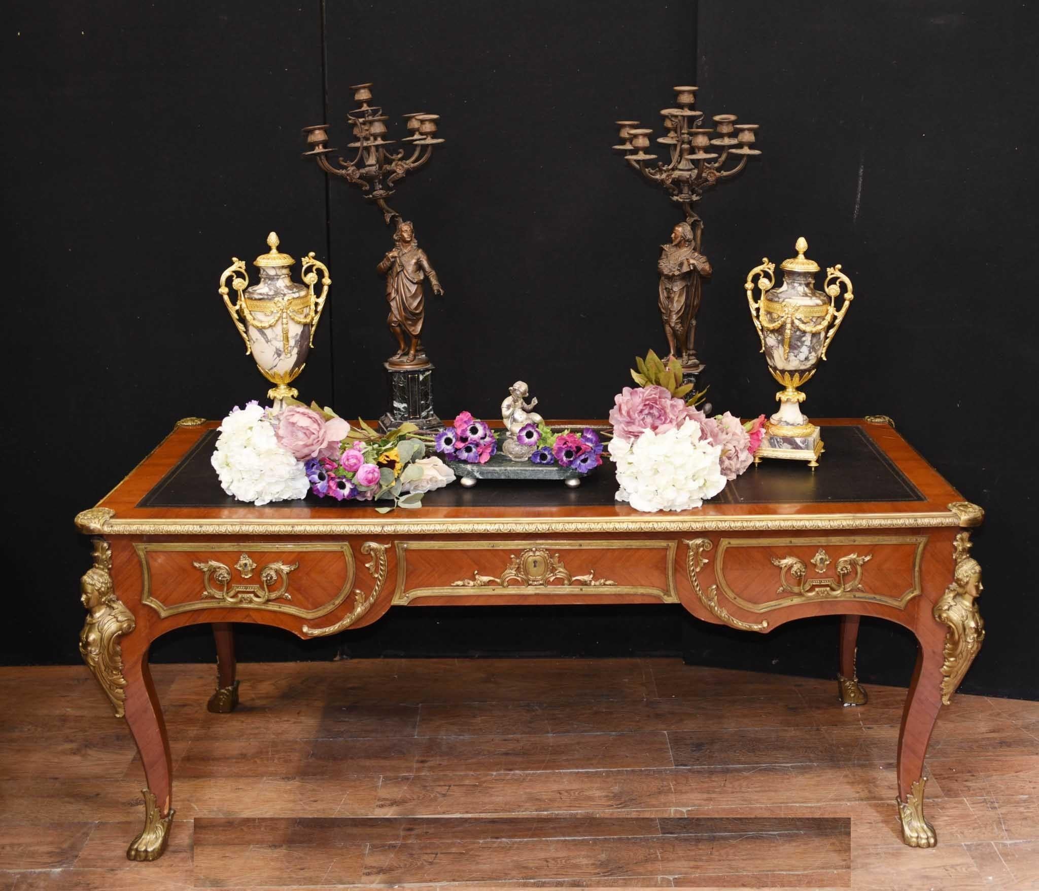 Large French Empire bureau plat or desk we date to circa 1930
Good size to it and a great look, perfect for home office set up
Ormolu fixtures original including maiden busts on table legs
Purchased from a dealer on Marche Biron at Paris antiques