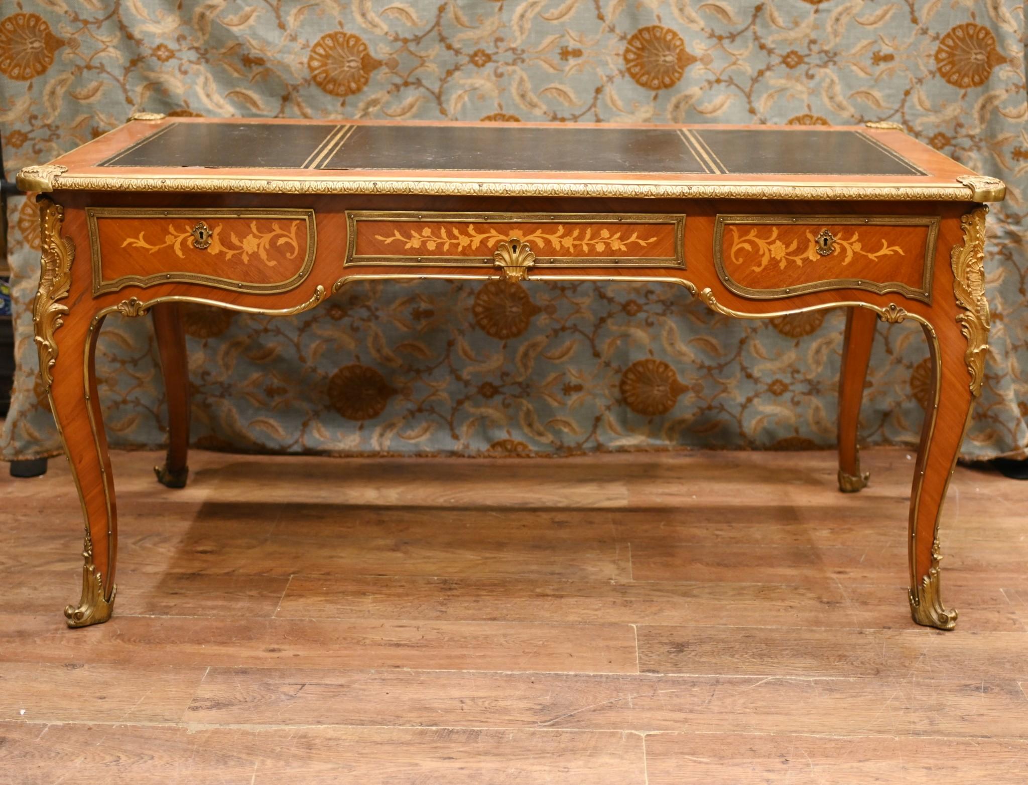 Quality antique French desk or bureau plat
Classic look crafted from kingwood with original ormolu fixtures
Good size at five feet - 154 CM - wide
Great for a home office set up
Bought from a dealer on Rue de Rossiers at Paris antiques