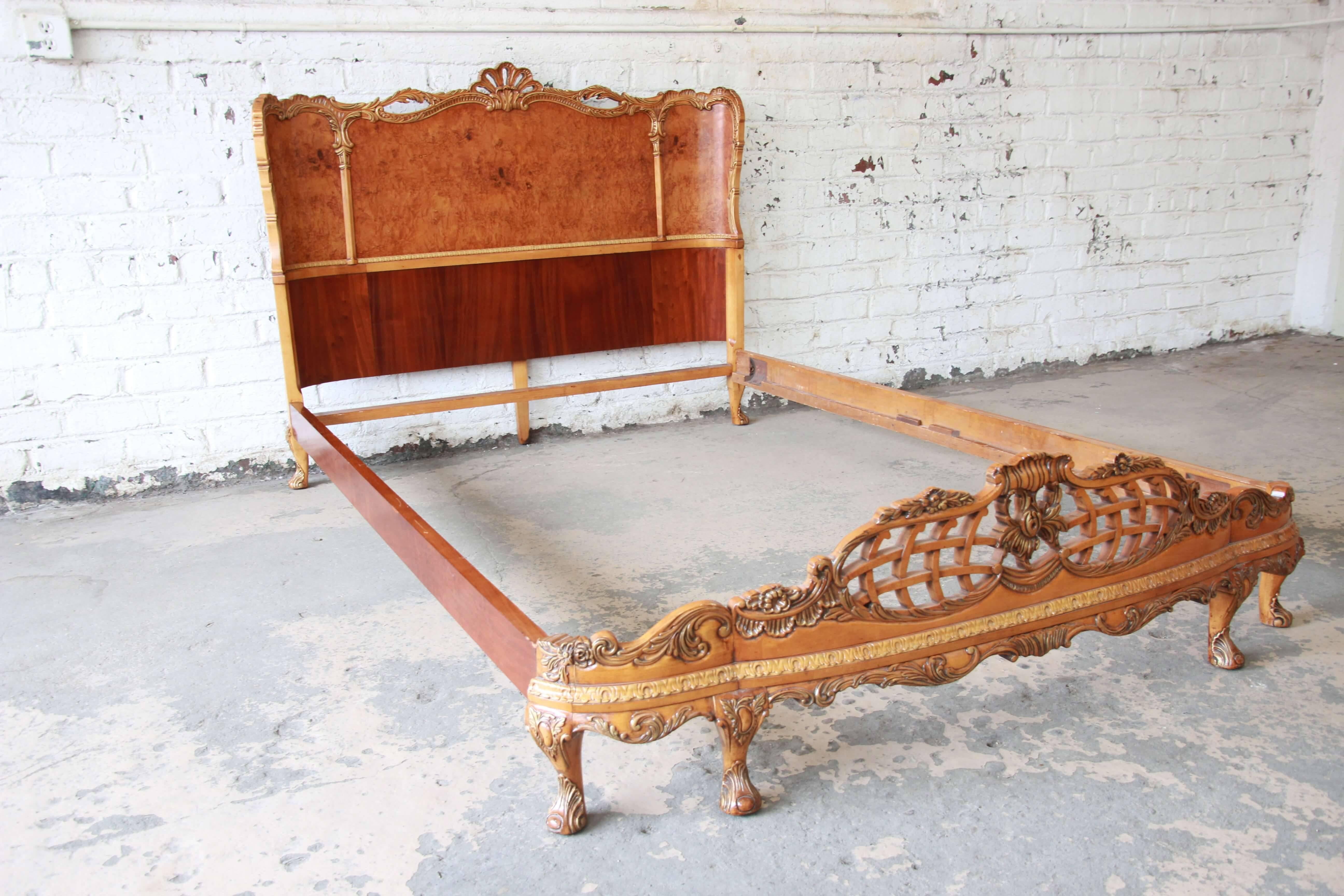 Offering a beautiful 1920s burled maple full-size bed by Romweber. This stunning French piece has intricate and ornate carvings with eye catching burled wood. The headboard and footboard both have pierced wood design and traditional French styles.