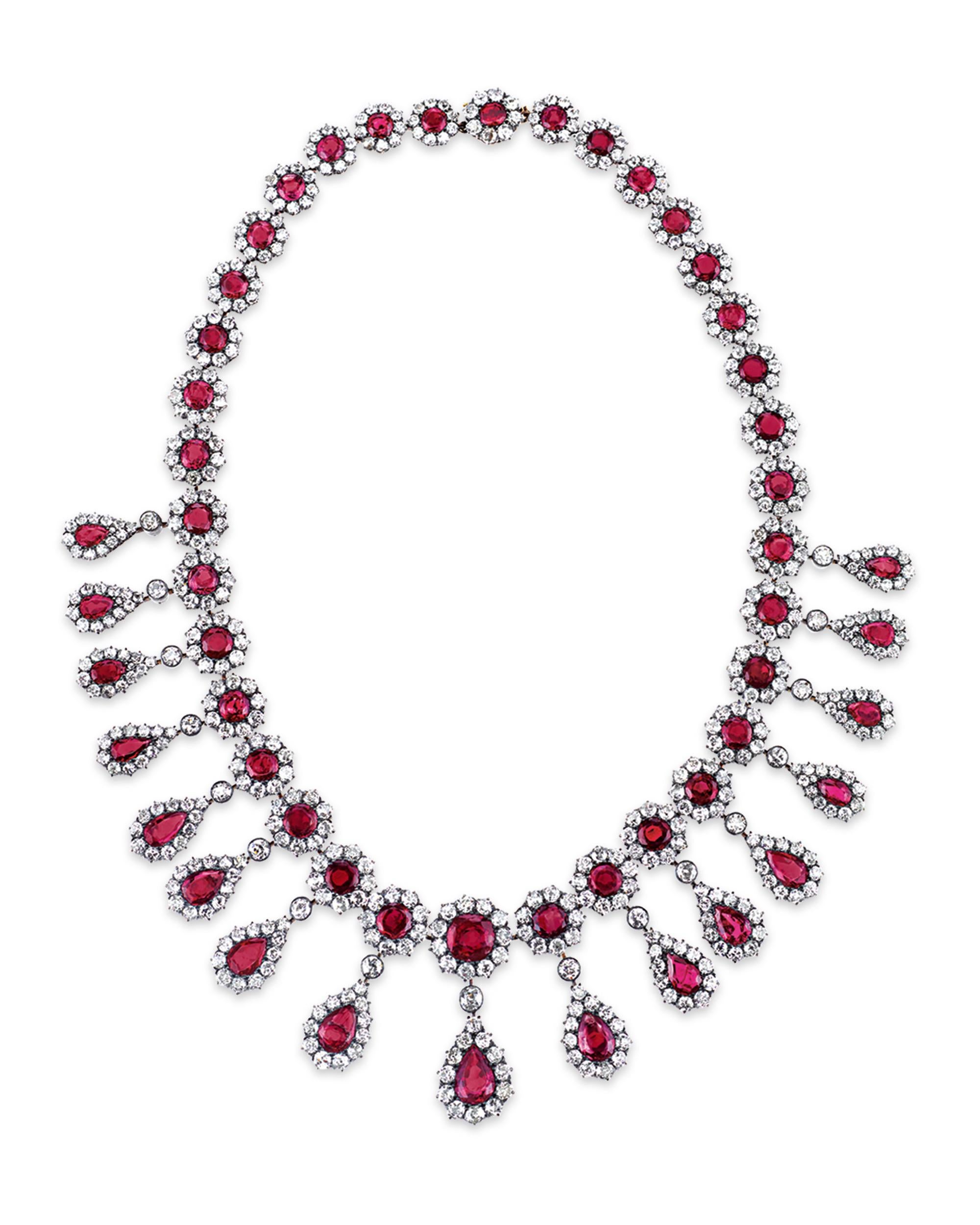 Sumptuous Burma rubies and vibrant white diamonds come together in this sensational antique necklace. Featuring a remarkable red hue, the Burma rubies total approximately 50 carats, while the diamonds that encircle them weigh a combined 30 carats.