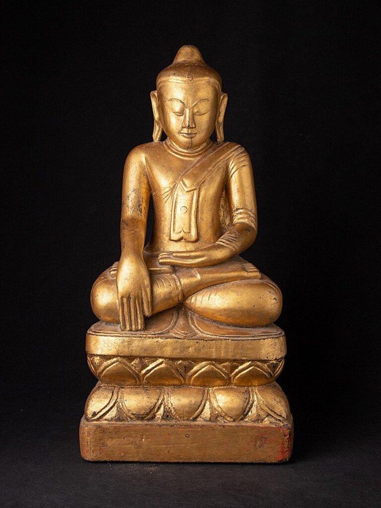 Material: wood
64 cm high 
32,6 cm wide and 20,7 cm deep
Weight: 9.45 kgs
Gilded with 24 krt. gold
Bhumisparsha mudra
Originating from Burma
18th century
With inscriptions in the pedestal, probably the name of the donor
Still in excellent