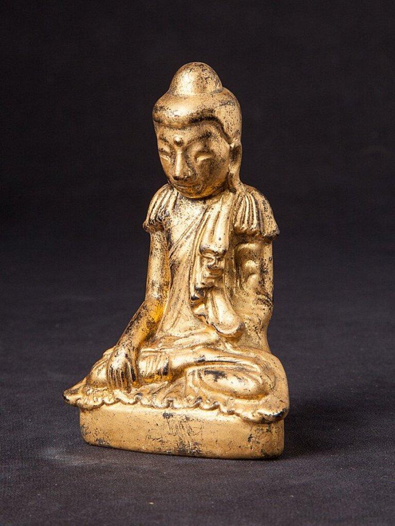 Material: lacquerware
9,8 cm high 
6,5 cm wide and 3 cm deep
Weight: 0.056 kgs
Gilded with 24 krt. gold
Bhumisparsha mudra
Originating from Burma
19th century.
 