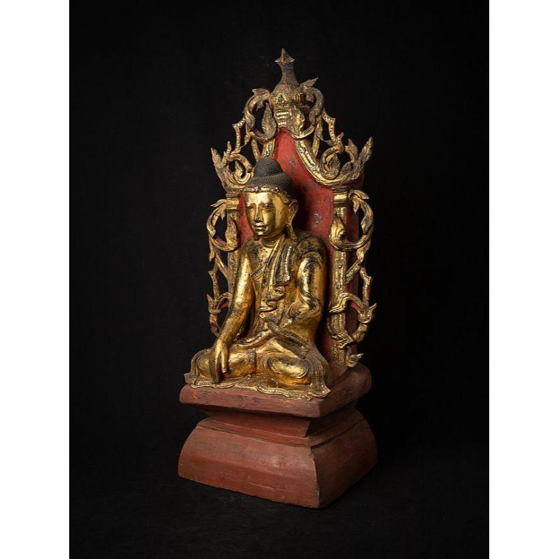 Material: lacquerware
79,5 cm high 
38 cm wide and 25,5 cm deep
Weight: 6.6 kgs
Gilded with 24 krt. gold
Shan (Tai Yai) style
Bhumisparsha mudra
Originating from Burma
Early 19th century.

