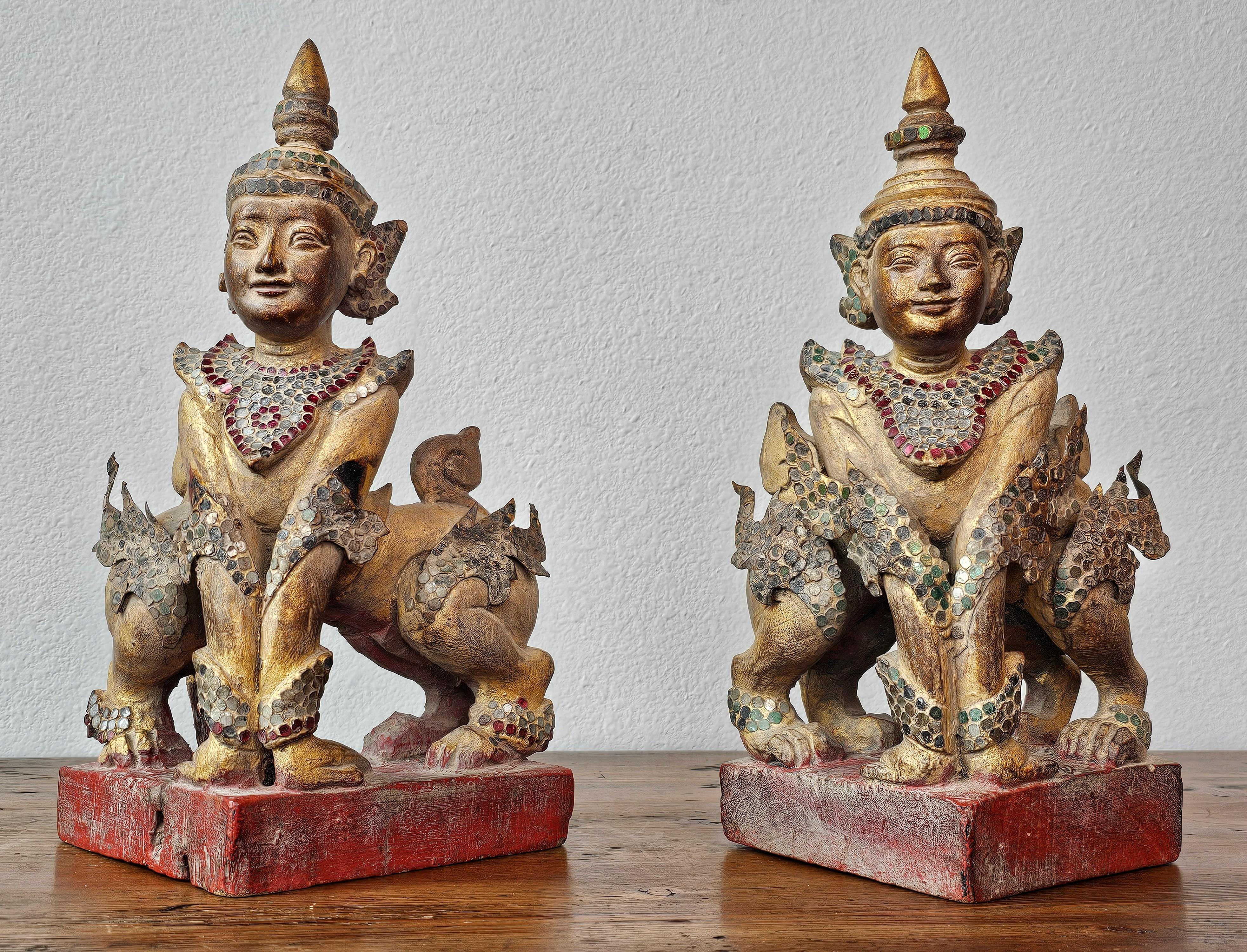 Hand-Carved Antique Burmese Carved Gilt Wood Glass Jeweled Manussiha Figure Pair