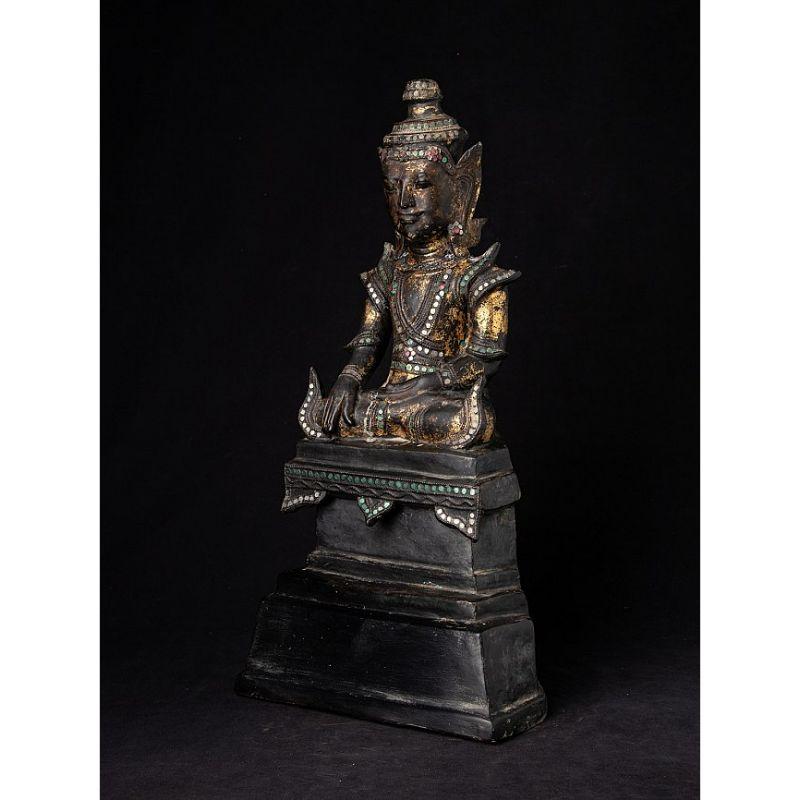 Statue Details:
Material: lacquerware
49,5 cm high 
25,4 cm wide and 19,6 cm deep
Weight: 0.875 kgs
With traces of 24 krt. gilding
Mandalay style
Bhumisparsha mudra
Originating from Burma
Late 18th / early 19th century
