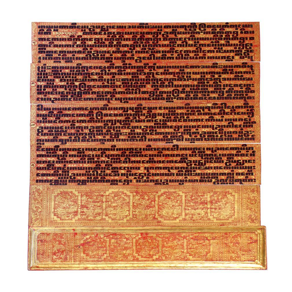 Antique Burmese Gilt Lacquered Kammavaca Manuscript, Consisting of 2 lacquered wood end covers and 16 double sided folios of lacquered cloth with black, red and gold leaf. This Kammacava manuscript is  highly ornamental with thickly applied lacquer
