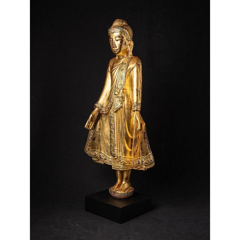 Material: wood
83,6 cm high 
41 cm wide and 20,1 cm deep
Weight: 6.25 kgs
Gilded with 24 krt. gold
Mandalay style
Originating from Burma
19th century
With inlayed eyes
A very beautiful piece !.

