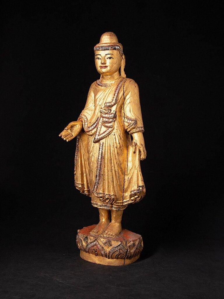 Material: wood
50 cm high 
17,4 cm wide and 13,5 cm deep
Weight: 2.492 kgs
Gilded with 24 krt. gold
Mandalay style
Originating from Burma
19th century.
 