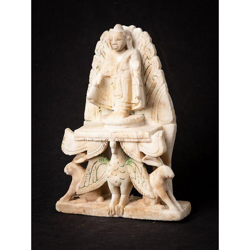 Material: marble
29,6 cm high 
21,8 cm wide and 7,5 cm deep
Weight: 2.896 kgs
Shan (Tai Yai) style
Originating from Burma
18th century.

