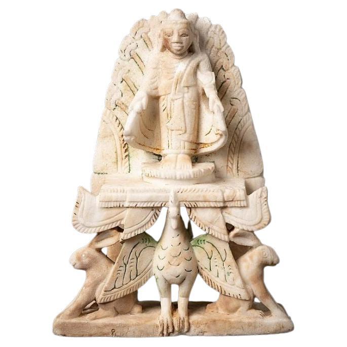 Antigua estatua birmana de Buda de mármol procedente de Birmania