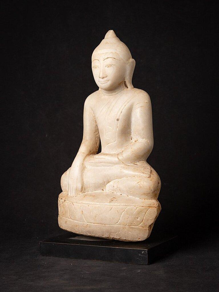 Material: marble
42,5 cm high 
23 cm wide and 14 cm deep
Weight: 9.684 kgs
Shan (Tai Yai) style
Bhumisparsha mudra
Originating from Burma
18th century.
 