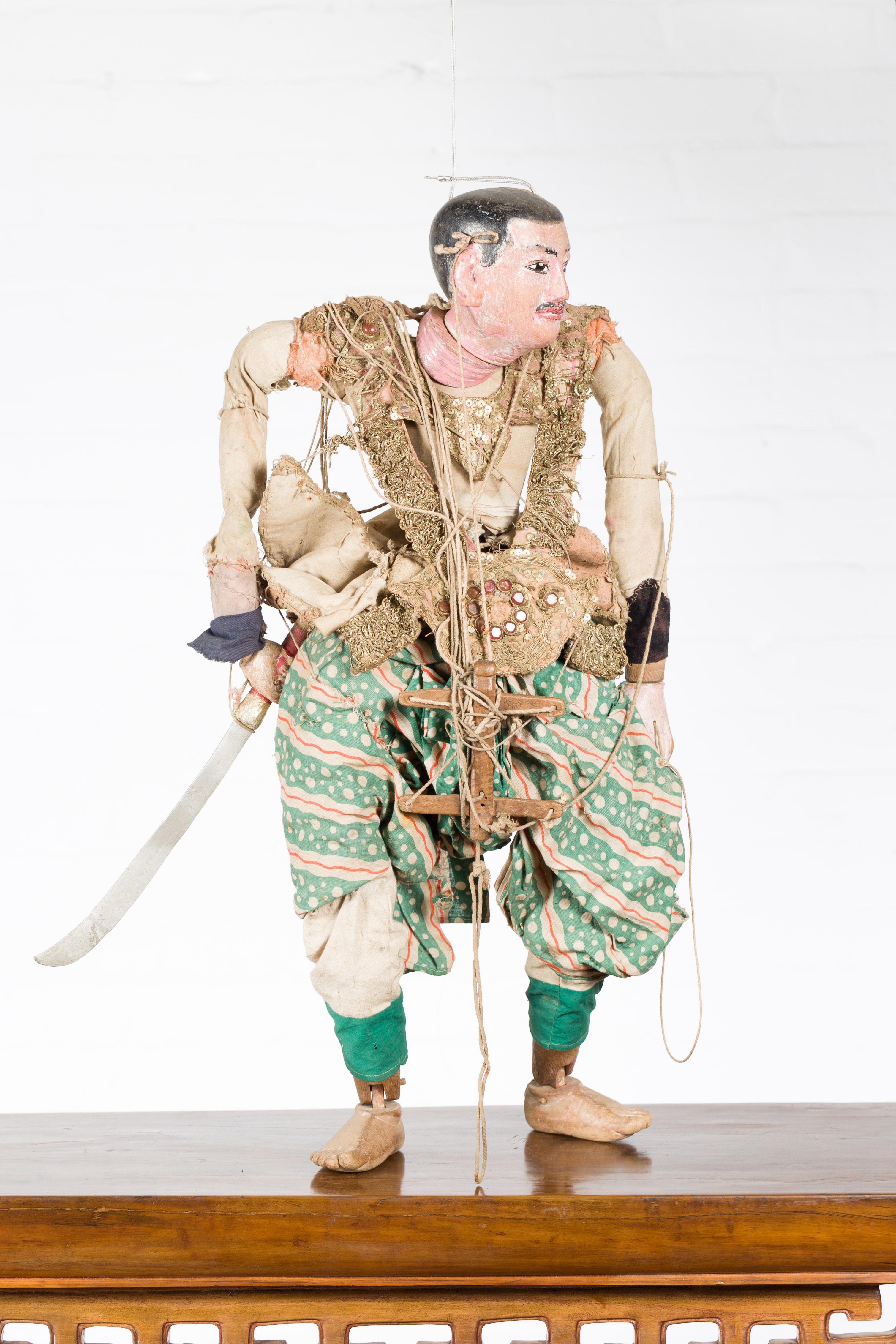 Antique Burmese Marionette of a Soldier Holding a Saber, with Golden Accents In Good Condition In Yonkers, NY