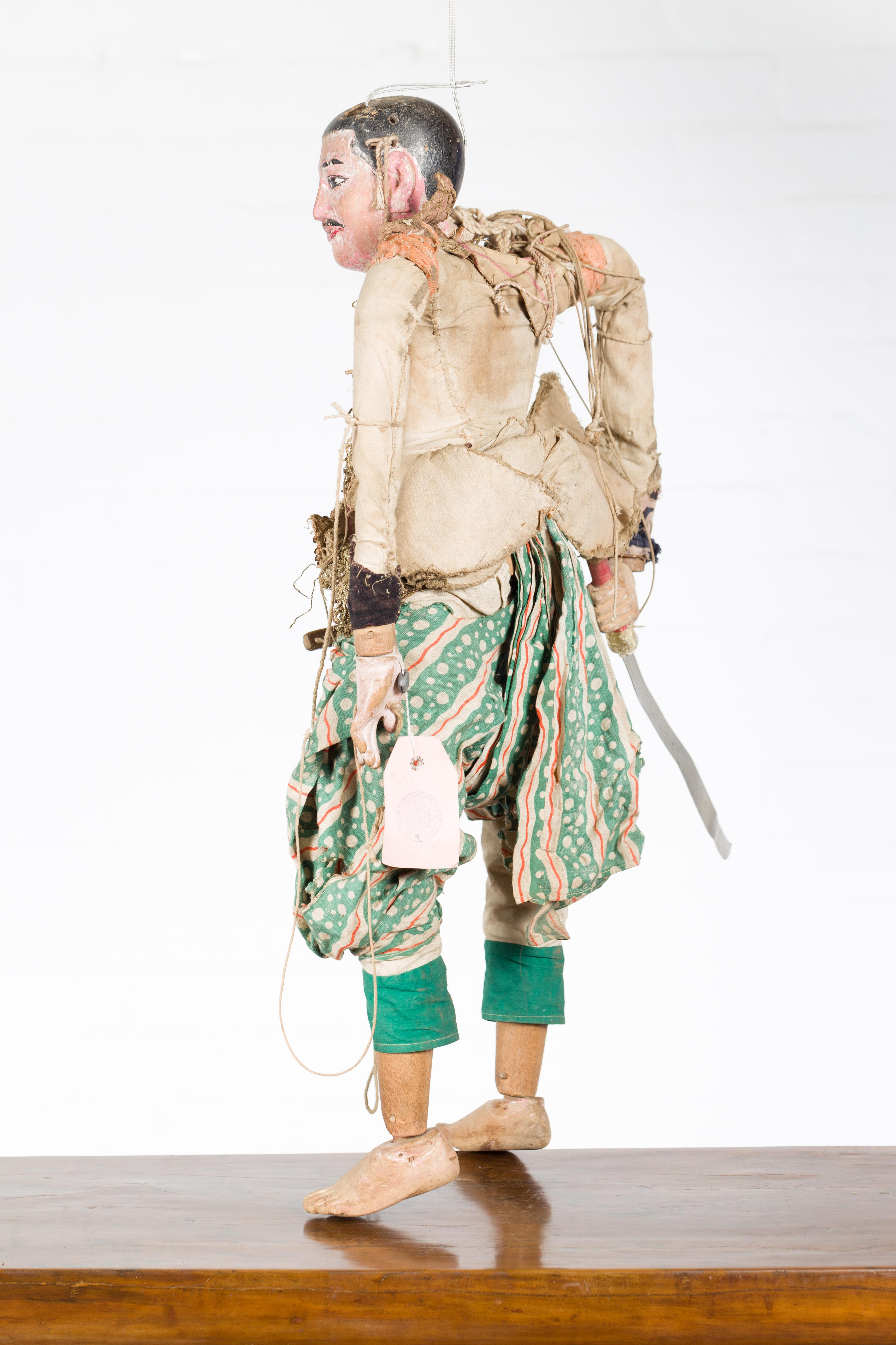 Antique Burmese Marionette of a Soldier Holding a Saber, with Golden Accents 1