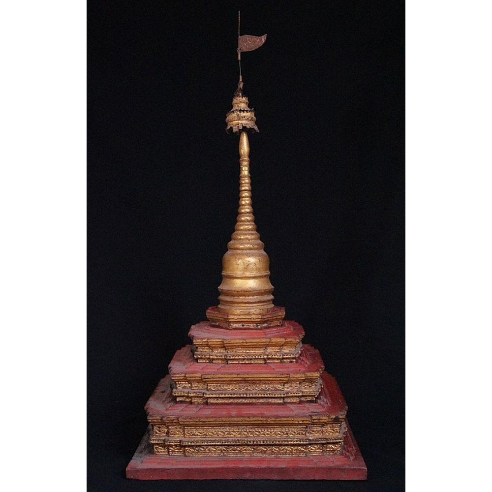 Material: wood
Measures: 95 cm high 
The base is 46 x 46 cm
Weight: 9.7 kgs
Gilded with 24 krt. gold
Mandalay style
Originating from Burma
19th century
7 seperate parts
Very special !

