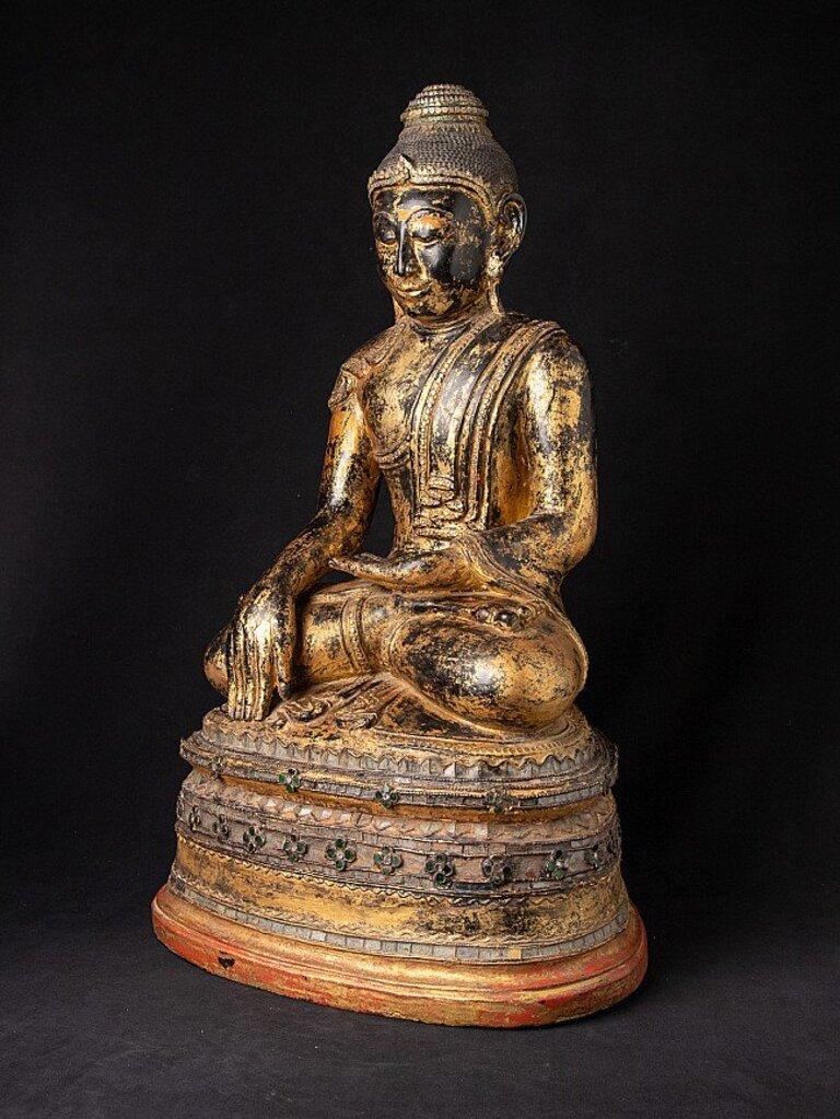 Material: lacquerware
Measures: 70,6 cm high 
43 cm wide and 33,5 cm deep
Weight: 5.8 kgs
Gilded with 24 krt. gold
Shan (Tai Yai) style
Bhumisparsha mudra
Originating from Burma
17-18th century
Very special !
  